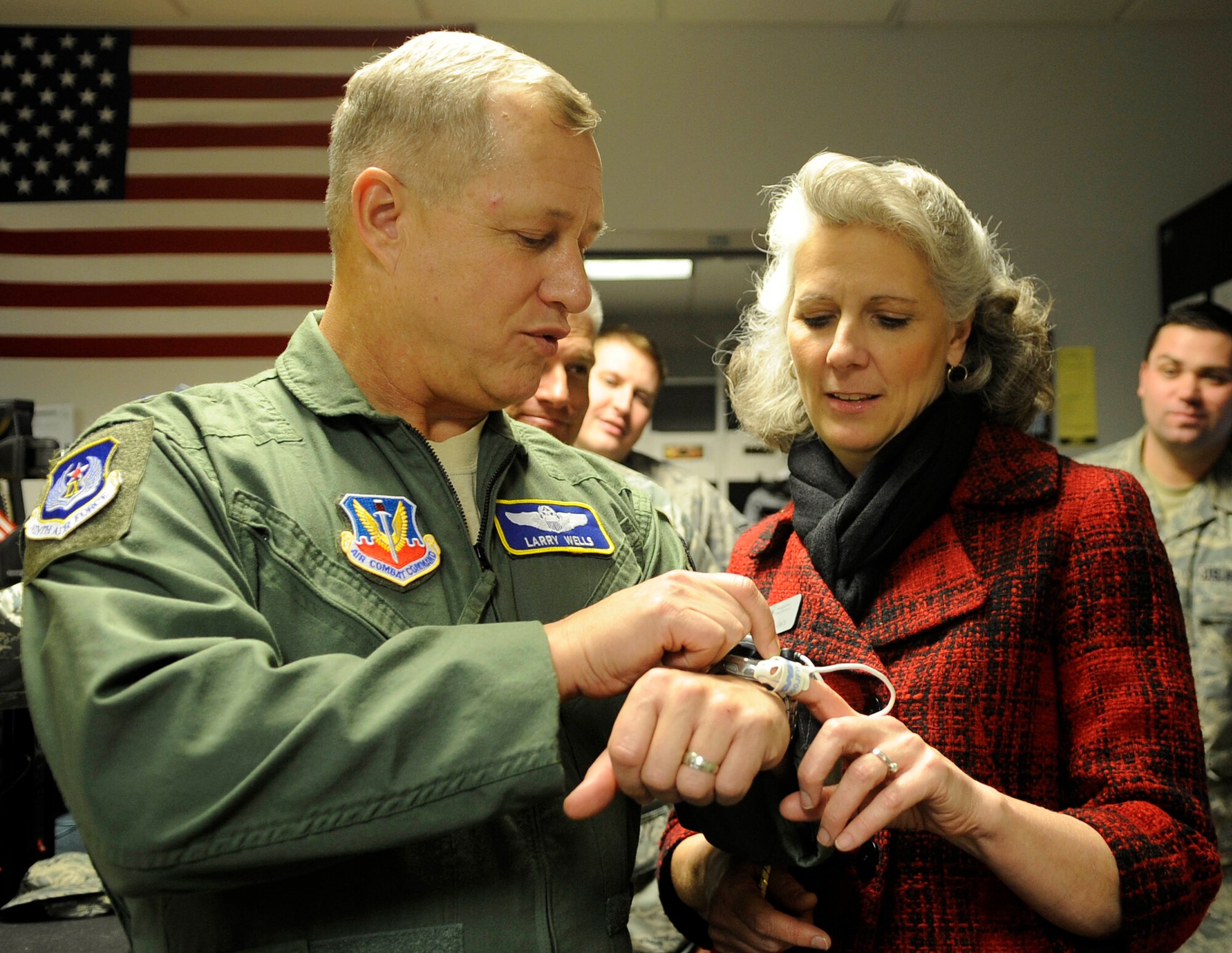 U.S. Air Force Maj. Gen. Lawrence Wells, 9th Air Force commander, and wife Kathy, try on a heart monitor during a visit to Langley Air Force Base, Va., Jan. 11, 2012.Wells and his wife visited Joint Base Langley-Eustis, Jan. 9 through 11, meeting with base personnel and learning about the evolution of one the military’s joint bases. (U.S. Air Force photo by Staff Sgt. Dana Hill/Released)