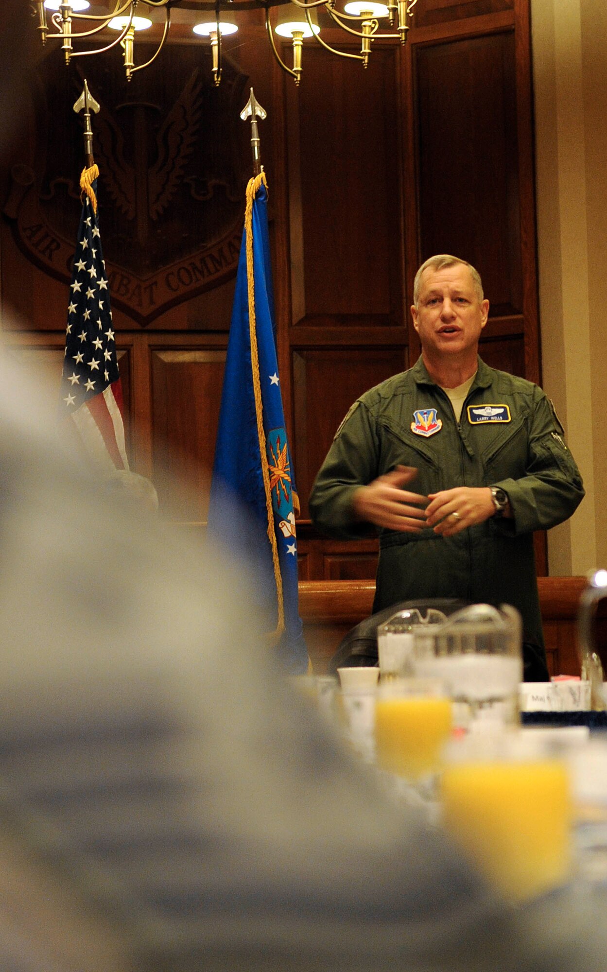 U.S. Air Force Maj. Gen. Lawrence Wells, 9th Air Force commander, speaks with senior noncommissioned officers during a visit to Langley Air Force Base, Va., Jan. 11, 2012.Wells addressed concerns Airmen had about recent changes and issues, including budget cuts, force management and combat operations worldwide. (U.S. Air Force photo by Staff Sgt. Dana Hill/Released)