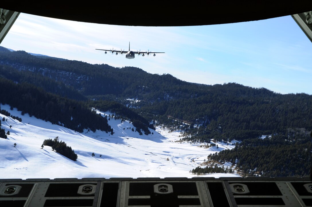 A 522nd Special Operations MC-130J Commando II aircraft flies over the skies of New Mexico, Jan. 4, 2012.  The 522 SOS is stationed at Cannon Air force Base, N.M. and the MC-130J provides in-flight refueling, infiltration/exfiltration and aerial delivery resupply of special operations forces.  (U.S. Air Force photo by Senior Airman James Bell)