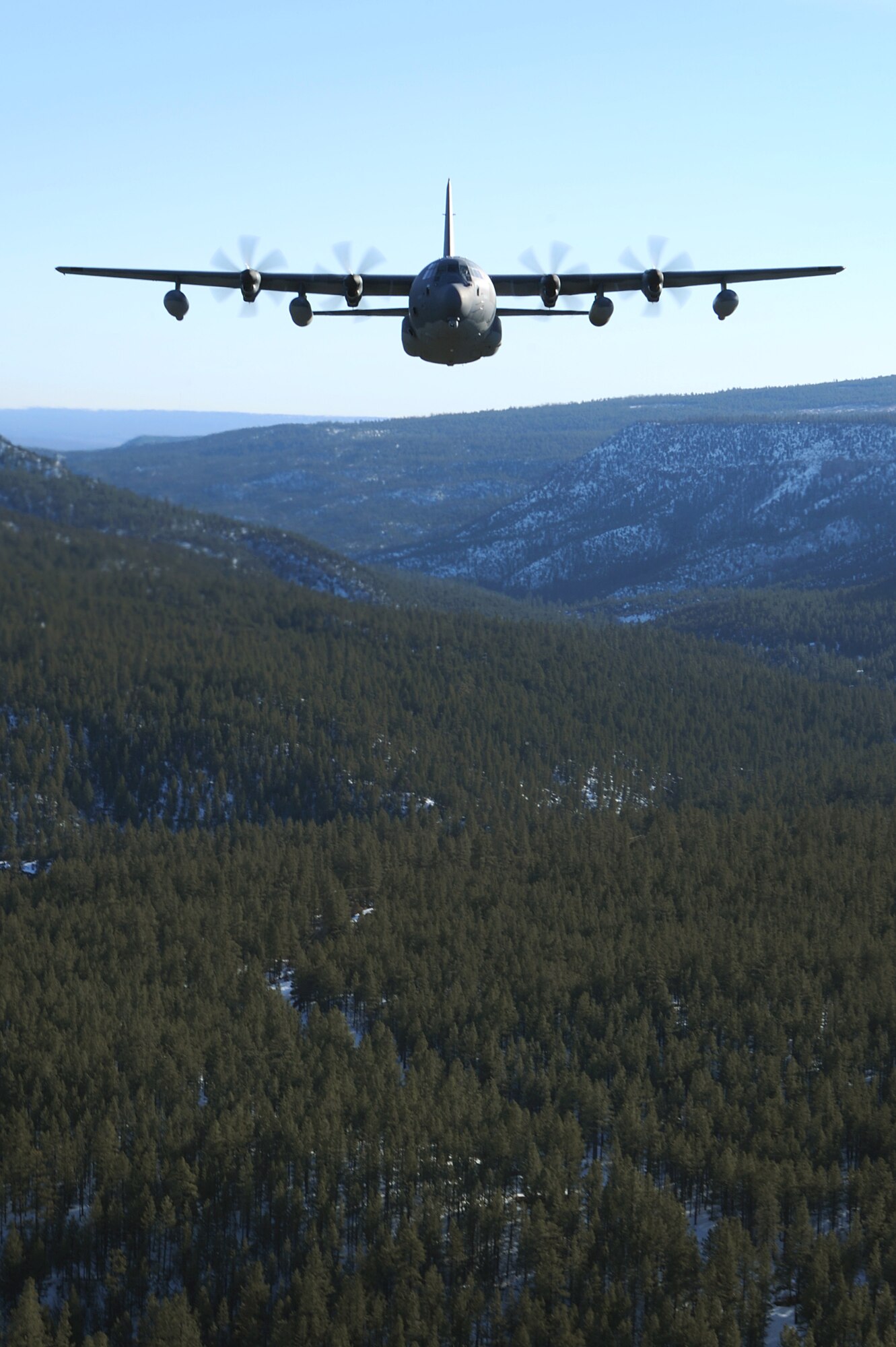 A 522nd Special Operations Squadron MC-130J Commando II aircraft, flies over the skies of New Mexico, Jan. 4, 2012.  The 522 SOS is stationed at Cannon Air Force Base, N.M. and the MC-130J provides in-flight refueling, infiltration/exfiltration and aerial delivery resupply of special operations forces.  (U.S. Air Force photo by Senior Airman James Bell)