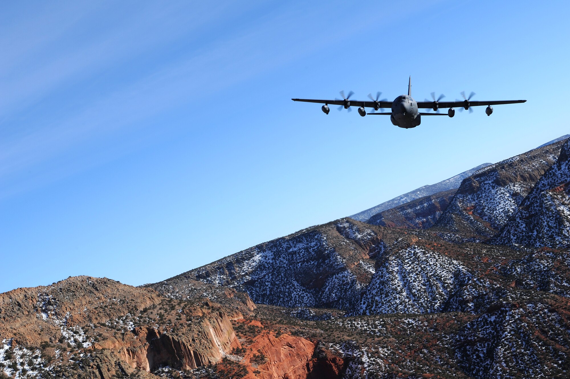 A 522nd Special Operations Squadron MC-130J Commando II aircraft, flies over the skies of New Mexico, Jan. 4, 2012.  The 522 SOS is stationed at Cannon Air Force Base, N.M. and the MC-130J provides in-flight refueling, infiltration/exfiltration and aerial delivery resupply of special operations forces.  (U.S. Air Force photo by Senior Airman James Bell)