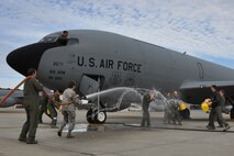 Col. B.S. Davis is hosed down by members of the 916th Operations Group upon his final flight with the wing on Jan. 10, 2012. Davis leaves the Seymour Johnson wing to be the new operations group commander for the Reserve wing at Andrews AFB. (USAF photo by MSgt. Wendy Lopedote, 916ARW/PA)