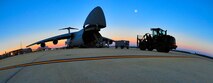 Members of the 20th Logistics Readiness Squadron prepare to load the final equipment onto a C-5 Galaxy, Jan. 6, 2012. Three C-5s landed at Shaw Air Force Base S.C., over a three-day period to pick up Airmen and supplies in support of a deployment tasking. (U.S. Air Force Photo by Senior Airman Neil D. Warner/Released)