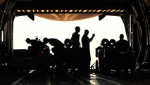 Members of the 20th Logistics Readiness Squadron, secure cargo inside a C-5 Galaxy, Jan. 6, 2012. Three C-5s landed at Shaw Air Force Base S.C., over a three-day period to pick up Airmen and supplies in support of a deployment tasking. (U.S. Air Force Photo by Senior Airman Neil D. Warner/Released)