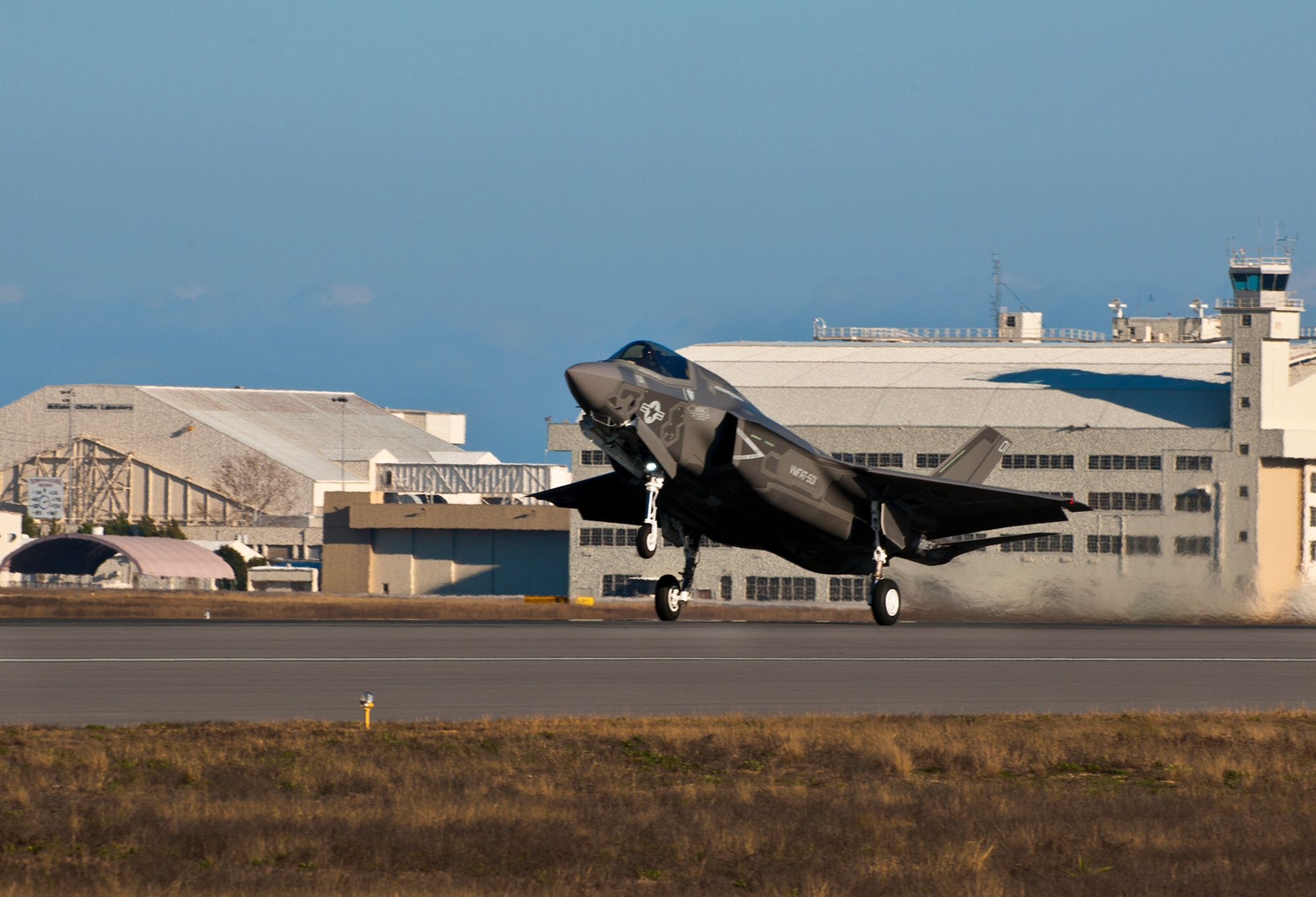 The Marine Corp’s newest aircraft, the F-35B Lightning II joint strike fighter touches down at its new home at Eglin Air Force Base, Fla.  The newest aircraft in the Department of Defense inventory belongs to Marine Fighter Attack Squadron 501. The Marines of VMFAT-501 received two F-35Bs Jan. 11.  Both aircraft were escorted in by Marine F-18 Hornets.  (U.S. Air Force photo/Samuel King Jr.)