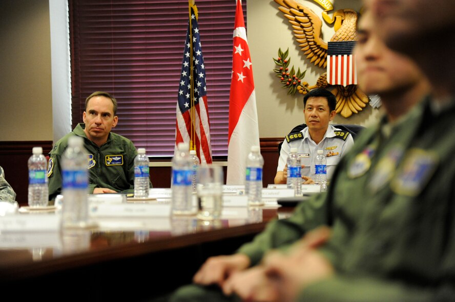 LAUGHLIN AIR FORCE BASE, Texas – Col. Kok Siong Lim, Singapore’s Air Force Training Command commander, sits down for a mission brief with Col. Tom Murphy, 47th Flying Training Wing commander, and other base leaders here Jan. 10. Lim and his accompanying group came to Laughlin to visit Specialized Undergraduate Pilot Training students from Singapore. (U.S. Air Force photo/Airman 1st Class Nathan L. Maysonet)