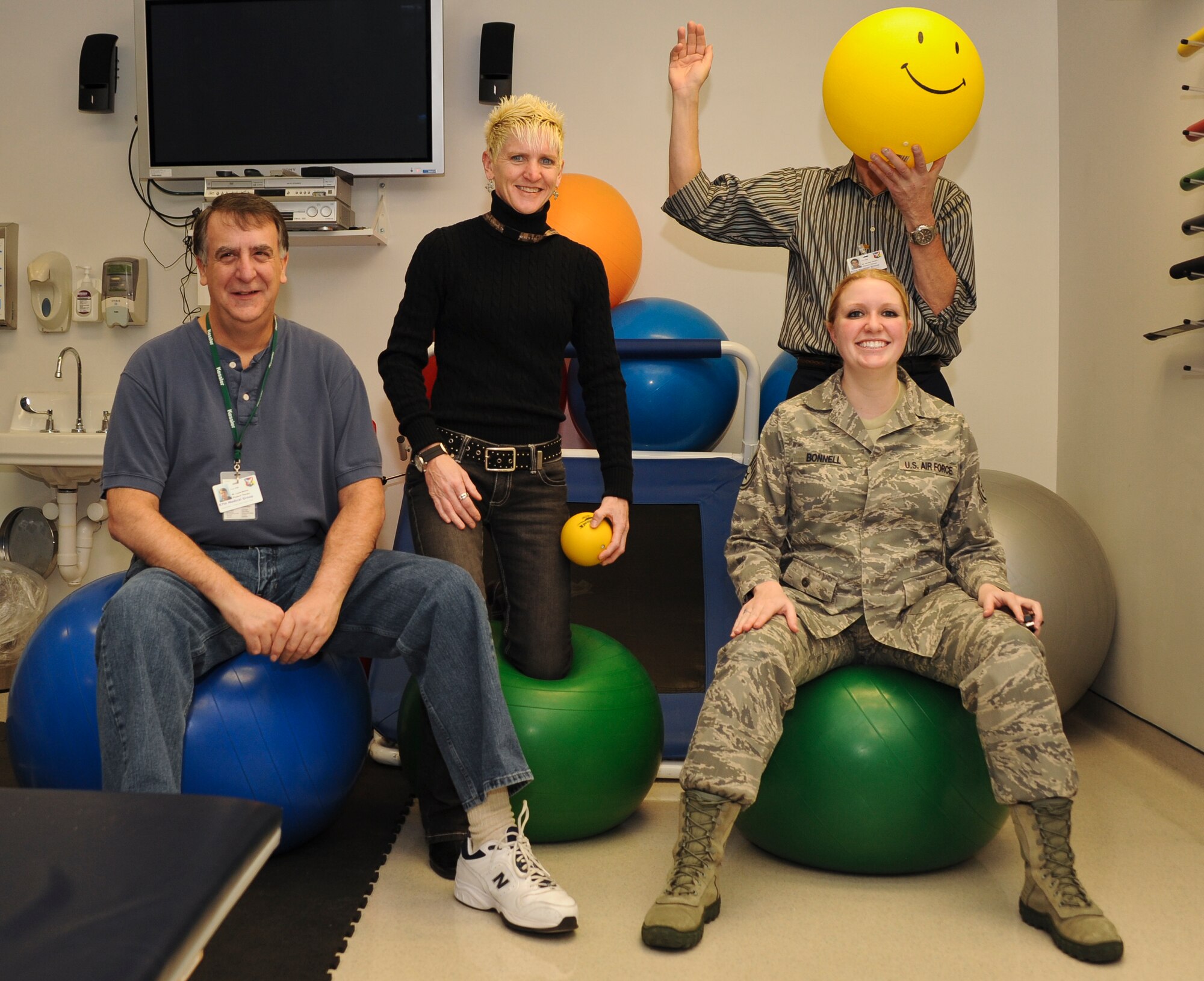 The 87th Physical Therapy staff show that physical therapy is not all work and no play. The 14 physical therapy staff members perform rehabilitative therapy using more than $300,000 worth of equipment. The equipment ranges from machines that use electric currents to stimulate a patients muscles to something as simple as a pencil, which is used to work out knots in muscles. (U.S. Air Force photo by Airman 1st Class Dennis Sloan/Released)