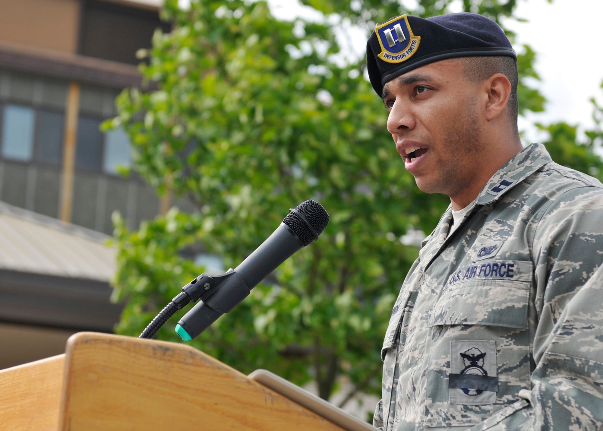 Capt. Gil Wyche II, 48th Security Forces Squadron officer in charge of logistics and resources, speaks during a memorial and retreat ceremony at the base flag poles on May 20, 2011.  Wyche was recently selected as the 2011 U.S. Air Force Security Forces Company Grade Officer of the Year. (U.S. Air Force photo by Senior Airman Tiffany M. Deuel)