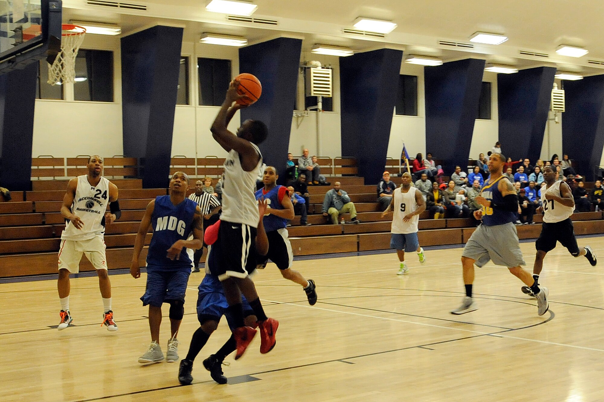 MISAWA AIR BASE, Japan - Ramsey Farrington, Misawa Security Operations Center team member, shoots a two-point shot during the base intramural basketball championship game held at the Potter Fitness Center here, Jan. 11. The MSOC defeated the 35th Medical Group 55-49 in game two of the double elimination tournament. (U.S. Air Force photo/Tech. Sgt. Marie Brown)