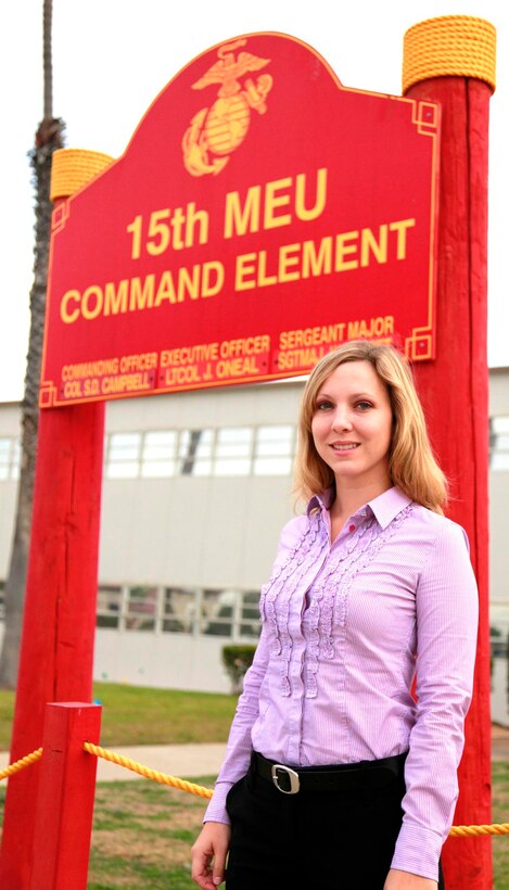 Recently, the 15th Marine Expeditionary Unit, Command Element, welcomed a new family readiness officer, Rebecca M. Roman. Coming from a family of Marines, the military lifestyle has always been a part of her life and has helped her recognize the issues that service members and their family members face. (U.S. Marine Corps photo by Lance Cpl. Timothy Childers)