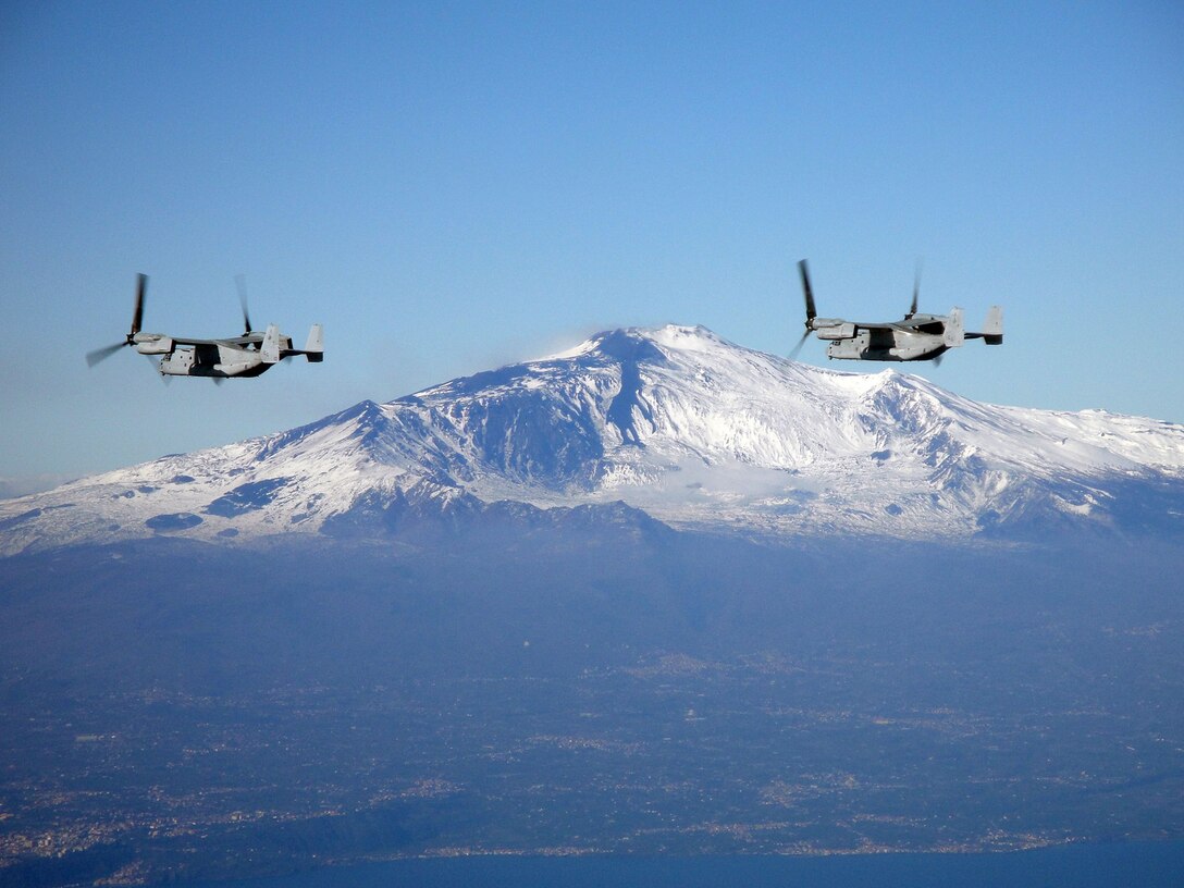 Two MV-22B Ospreys, with Marine Medium Tiltrotor Squadron 263 (Reinforced), 22nd Marine Expeditionary Unit, fly near Mount Etna, Italy during flight operations, Jan. 12, 2012.  The 22nd MEU is a multi-mission, capable force, comprised of an Aviation Combat Element, Marine Medium Tilt Rotor Squadron 263 (Reinforced); a Logistics Combat Element, Combat Logistics Battalion 22; a Ground Combat Element, Battalion Landing Team, 2nd Battalion, 2nd Marine Regiment; and its Command Element.