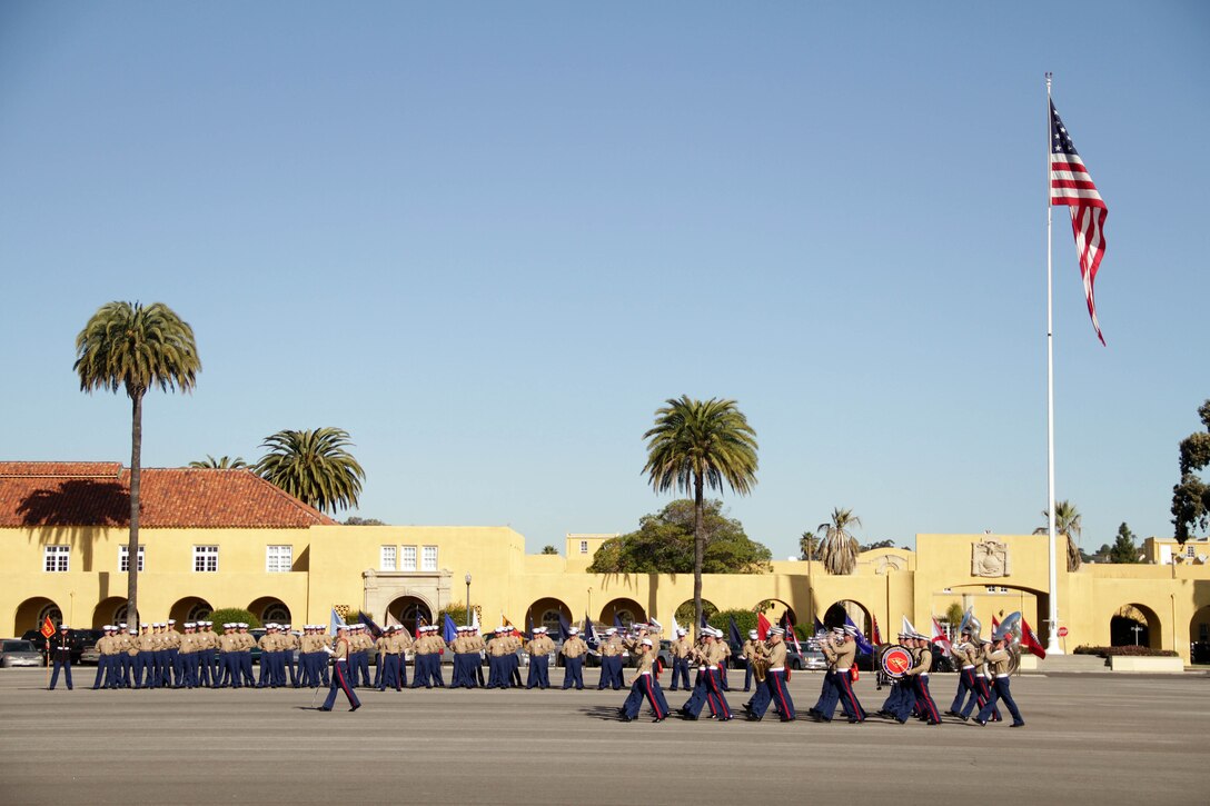 The Third Marine Aircraft Wing Band marches across the parade deck during a boot camp graduation Jan. 13. The ceremony was one of many events teachers witnessed during the Recruiting Station Twin Cities 2012 Educators Workshop. For additional imagery from the event, visit www.facebook.com/rstwincities.