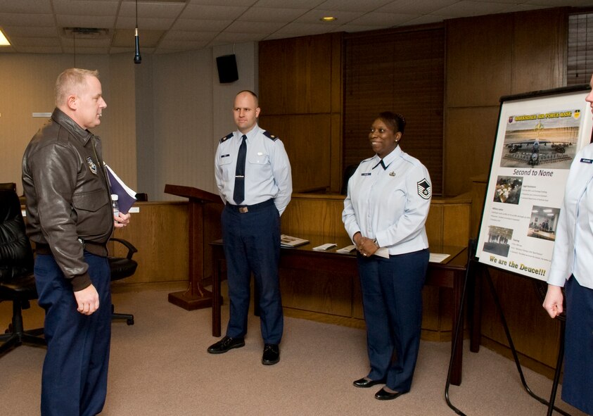 Col. Daniel Dant, Installation Excellence Award Board team member, receives a briefing from members of the Judge Advocates office on Barksdale Air Force Base, La., Jan. 9. Members of the base legal office briefed Dant on legal matters that affect members of Team Barksdale. (U.S. Air Force photo/Airman 1st Class Benjamin Gonsier)(RELEASED)