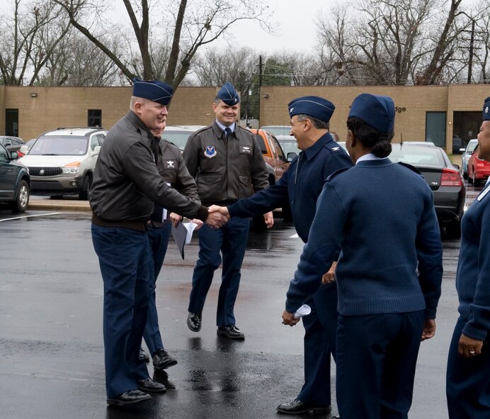 Col. Daniel Dant, Installation Excellence Award Board team member, shakes hands with Col. Paul Fortunato, 2nd Medical Group commander, on Barksdale Air Force Base, La., Jan. 9. Dant is part of a four member team that visited Barksdale to judge the base's quality-of-life programs. (U.S. Air Force photo/Airman 1st Class Benjamin Gonsier)(RELEASED)