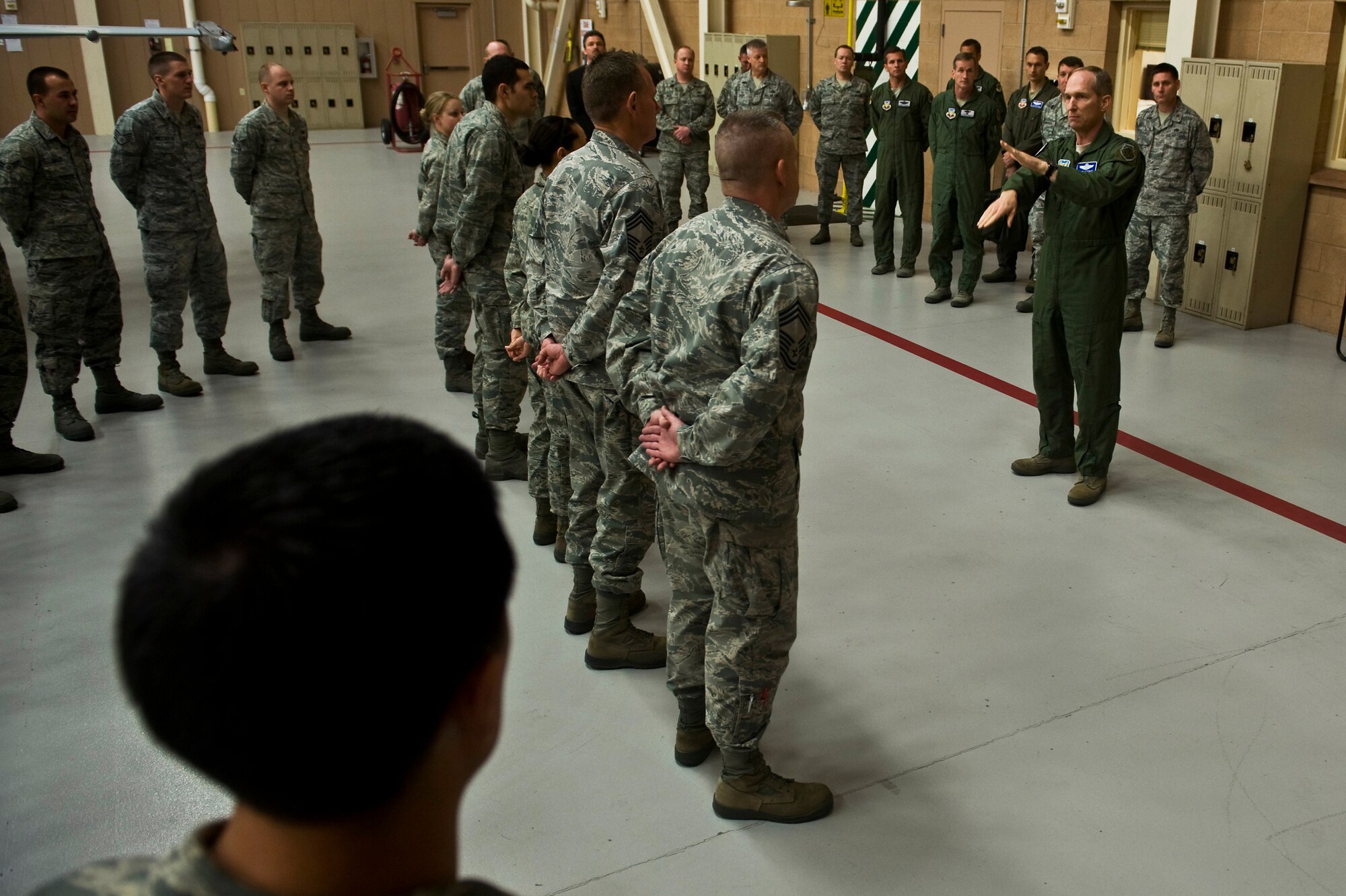 U.S. Air Force Gen. Mike Hostage, commander of Air Combat Command, answers questions about military retirement for Airmen of the 57th Aircraft Maintenance Squadron Jan. 11, 2012, inside the Viper Aircraft Maintenance Unit hangar at Nellis Air Force Base, Nev. Military retirements have been a subject of recent discussion within the Department of Defense. (U.S. Air Force photo by Senior Airman Brett Clashman/Released)