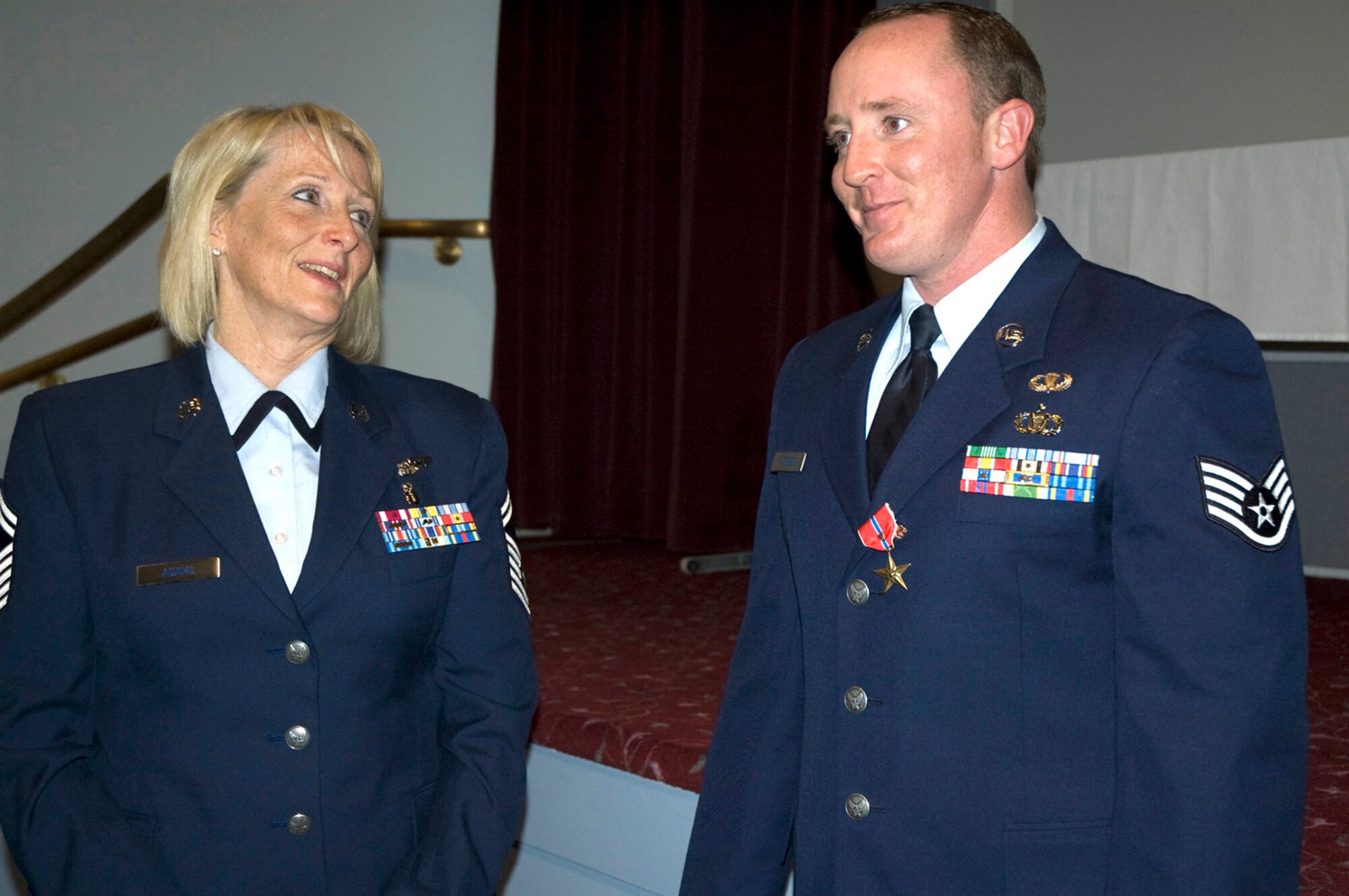 MCCHORD FIELD, Wash., - Staff Sgt. Verne Patterson, (right) 22nd Special Tactics Squadron here, was awarded the Bronze Star in a ceremony Jan. 10. He stands next to his proud mother, Senior Master Sgt. Barbara Adams, a Reservist with the 446th Aeromedical Staging Squadron here. (U.S. Air Force photo by Sandra Pishner)