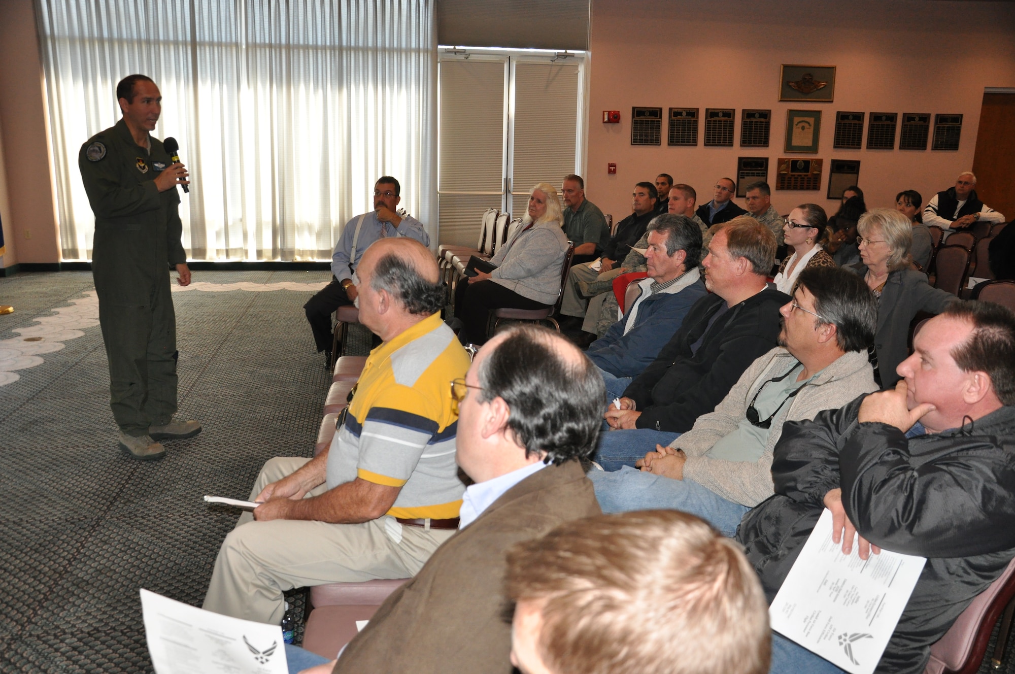 Colonel Orlando Sanchez, 325th Fighter Wing vice commander, addresses Team Tyndall members Jan. 13 during a town hall meeting at the Heritage Club. The meeting was called to address Air Force Appropriated Fund Civilian Department of Defense Force Efficiencies. Of the total Air Force civilian personnel, 4,500 positions were lost. Fourteen Tyndall civilian positions were cut, four of which were encumbered. (U.S. Air Force photo by Senior Airman Rachelle Elsea)