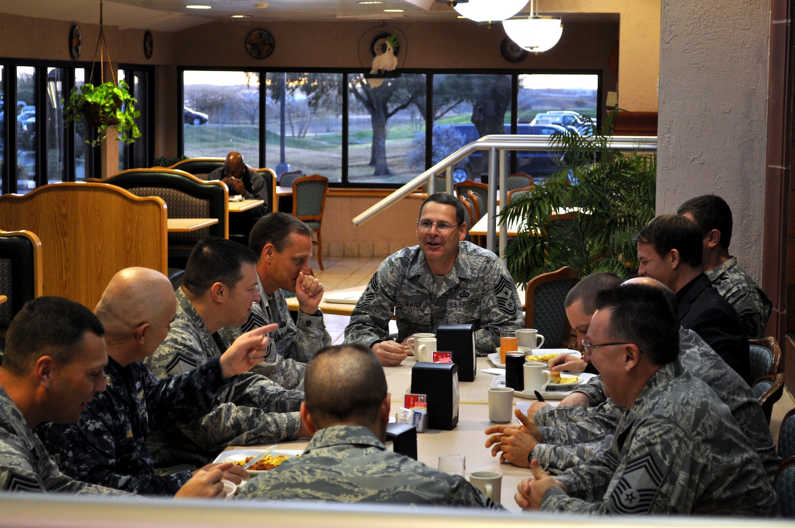 LACKLAND AIR FORCE BASE, Texas -- Command Master Chief Daniel Miller, senior enlisted leader for U.S. Cyber Command, National Security Agency and Central Security Service, speaks to fellow E-9s during a "Chief’s Call" at Gott Dining Facility here Jan. 12. Miller visited 24th Air Force and subordinate units of Air Forces Cyber during his 24th AF and AFCYBER update, to include recognition of some of the unit members for their outstanding work. The enlisted leaders exchanged views on trends in military culture, supervisory needs and ways of improving established programs during the Chief’s Call. (U.S. Air Force photo by William Parks)