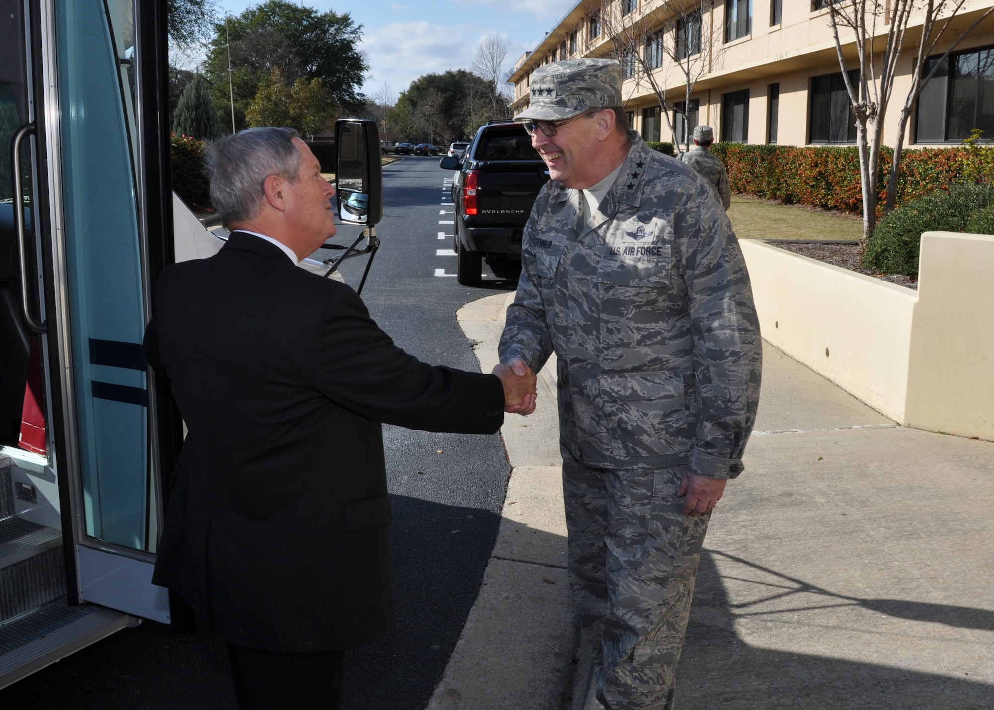 Lt. Gen. Charles E. Stenner Jr. commander of Air Force Reserve Command, welcomes U.S. Rep. Joe Wilson in front of the AFRC headquarters at Robins Air Force Base, Ga., Jan. 12, 2012. Wilson represents South Carolina’s 2nd Congressional District and is a member of the House Armed Services Committee. He visited the headquarters to discuss the AFRC Force Generation Center, last year’s operational accomplishments and the priorities for fiscal 2013. (U.S. Air Force photo/Peter Chadwick)