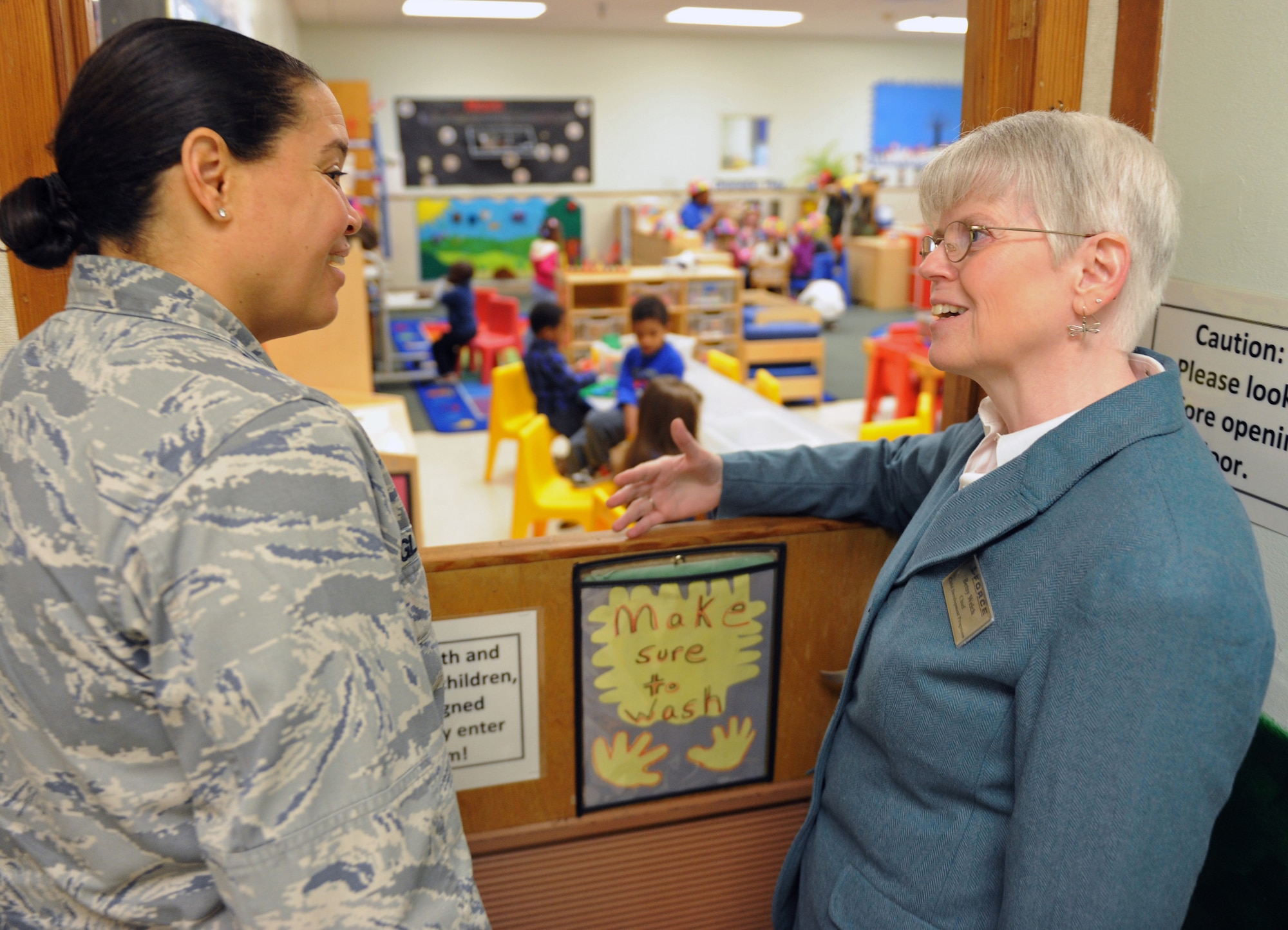 Betsy Welch, Child Development Programs chief, shares her thoughts about teaching young children with Col. Amanda Gladney, Installation Excellence Selection Board team member, at the Child Development Center on Barksdale Air Force Base, La., Jan. 10. Barksdale and Davis Monthan AFB have been selected as finalist for the Commander in Chief's Annual Installation Excellence Award. The winning base will receive $1 million to go toward quality-of-life improvements. (U.S. Air Force photo/Airman 1st Class Micaiah Anthony)(RELEASED)
