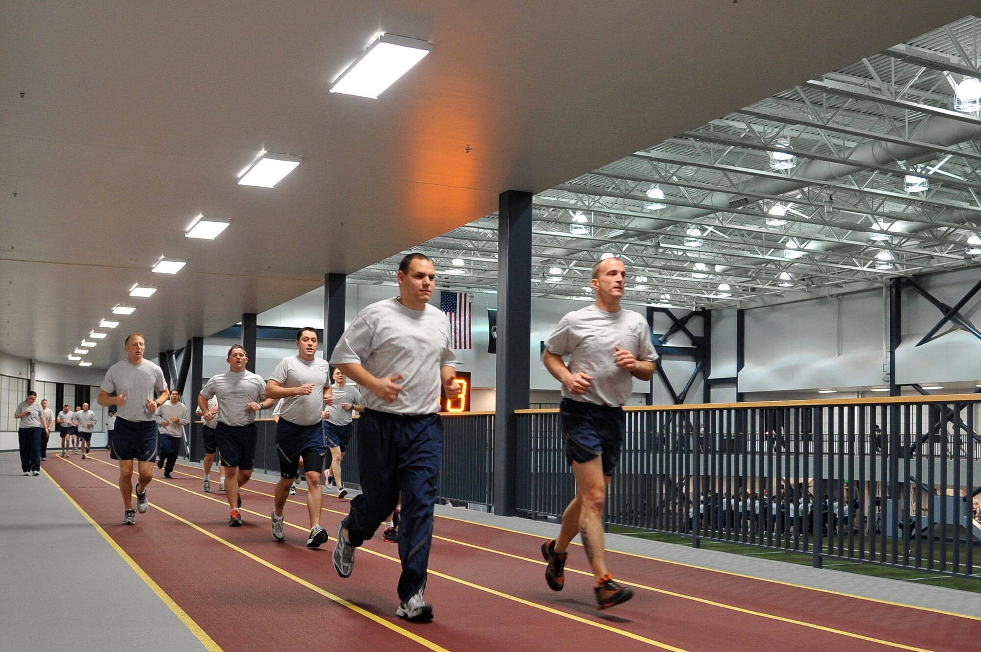 U.S. Air Force Airmen participate in a timed run during Fit Flag Jan. 13, 2012, Eielson Air Force Base, Alaska. Fit Flag is a bi-monthly event to promote health and camaraderie among wing members through competitive sports. (U.S. Air Force photo by Staff Sgt. Christopher Boitz/Released)