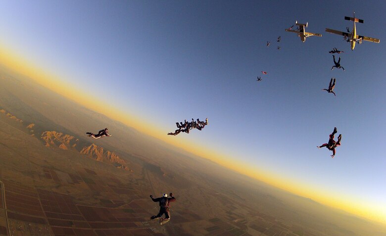 Parachutists with the Air Force Wings of Blue Parachute Competition Team attempt to set a three-point, 32-way college record during a jump competition over Eloy, Ariz. Wings of Blue teams won multiple medals at the competition, held Dec. 28, 2011 to Jan. 2, 2012. (U.S. Air Force photo/Lt. Col. Mike Love)