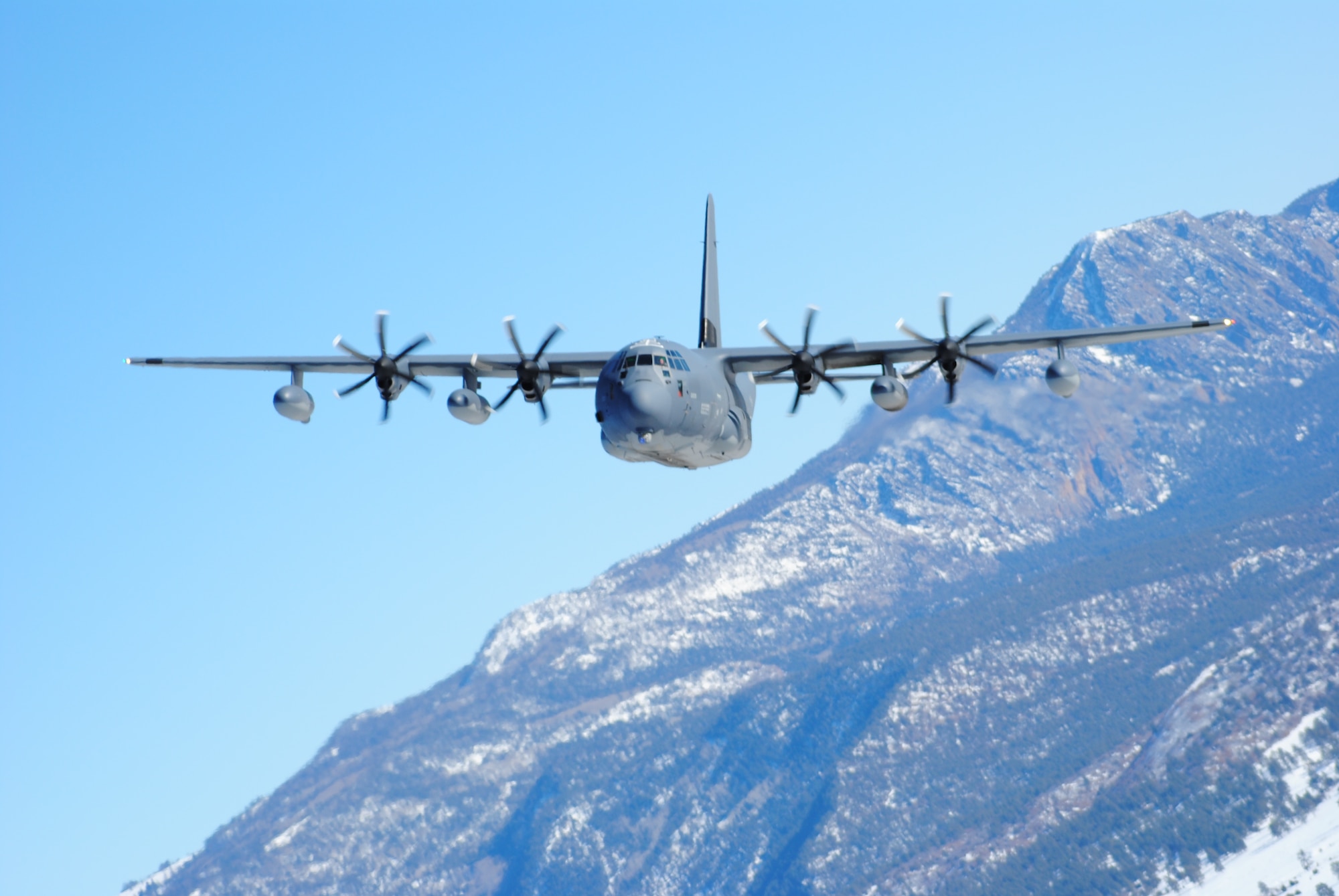An HC-130J Combat King II assigned to the 415th Special Operations Squadron flies over New Mexico terrain Dec. 27. U.S. Air Force Photo by John Cochran.