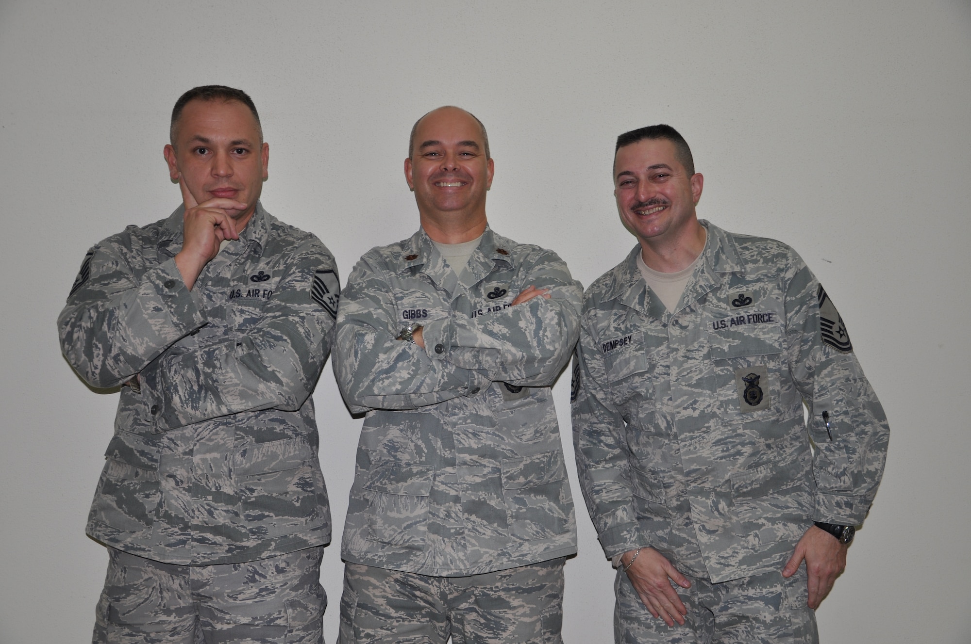 Master Sgt. Ralph Tomeo, Maj. Michael Gibbs and Senior Master Sgt. Victor Dempsey, 332nd Air Expeditonary Wing Antiterrorism and Information Protection members, pose for a photo Jan. 13, 2012 at an undisclosed location in Southwest Asia. Gibbs, Tomeo and Dempsey are deployed from Joint Base McGuire, N.J. (photo by Senior Airman Melanie Holochwost)