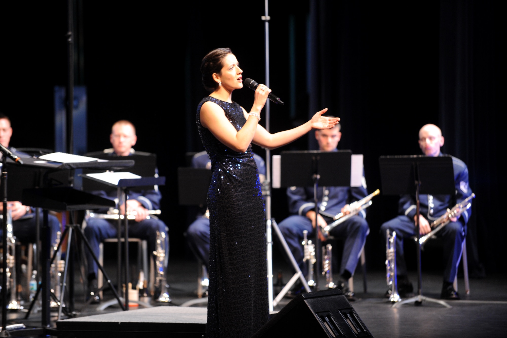 U.S. Air Force Tech. Sgt. Emily Lewis, a vocalist with the U.S. Air Force Band Ceremonial Brass and Lemoyne, Pa., native, sings during a concert Jan. 12, 2012, at Wesley Chapel, Fla. The Ceremonial Brass is on their first American tour playing a dozen concerts in Florida.  U.S. Air Force photo by Master Sgt. Adam M. Stump/Released.