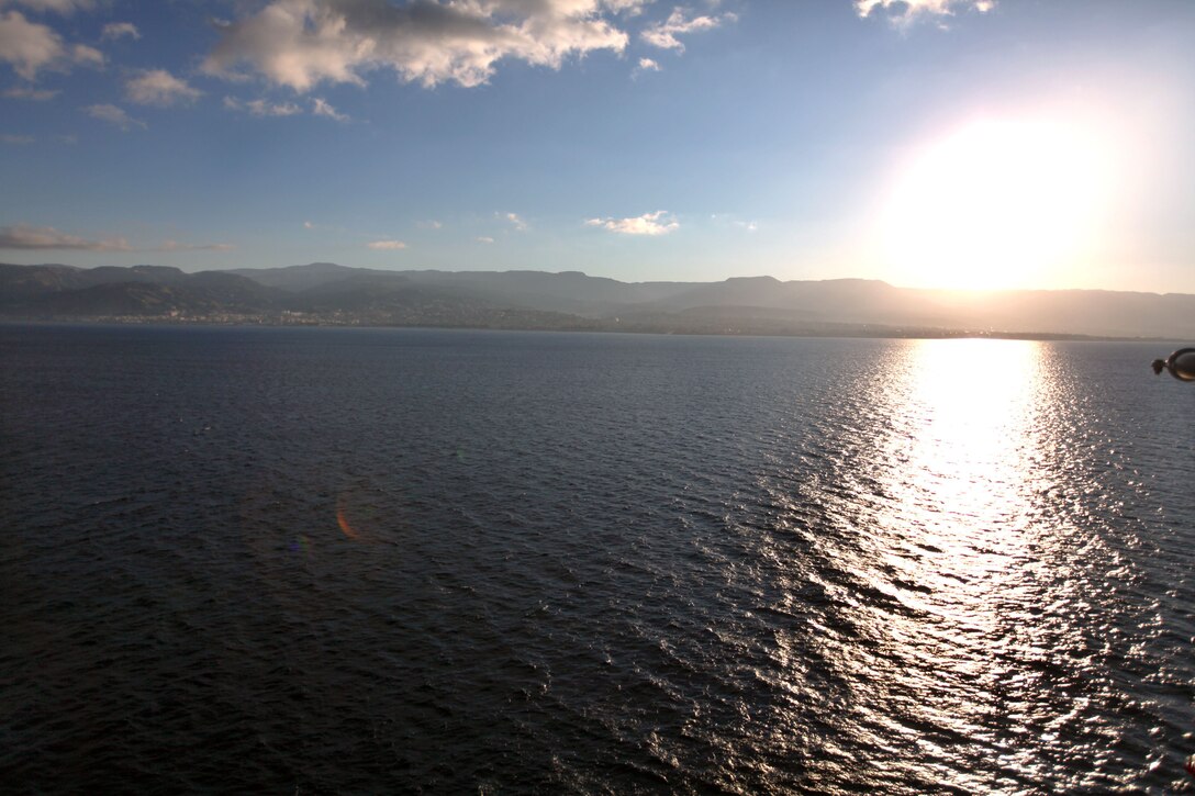 USS Bataan transits through the Strait of Messina, Jan. 13, 2011.  Marines and sailors, with the 22nd Marine Expeditionary Unit and the Bataan, were able to view and take photos of the Italian island of Sicily and mainland Italy during the transit. The Marines and sailors of the 22nd MEU are currently deployed with Amphibious Squadron 6 aboard the USS Bataan Amphibious Ready Group.  The 22nd MEU is a multi-mission, capable force, comprised of an Aviation Combat Element, Marine Medium Tilt Rotor Squadron 263 (Reinforced); a Logistics Combat Element, Combat Logistics Battalion 22; a Ground Combat Element, Battalion Landing Team, 2nd Battalion, 2nd Marine Regiment; and its Command Element.