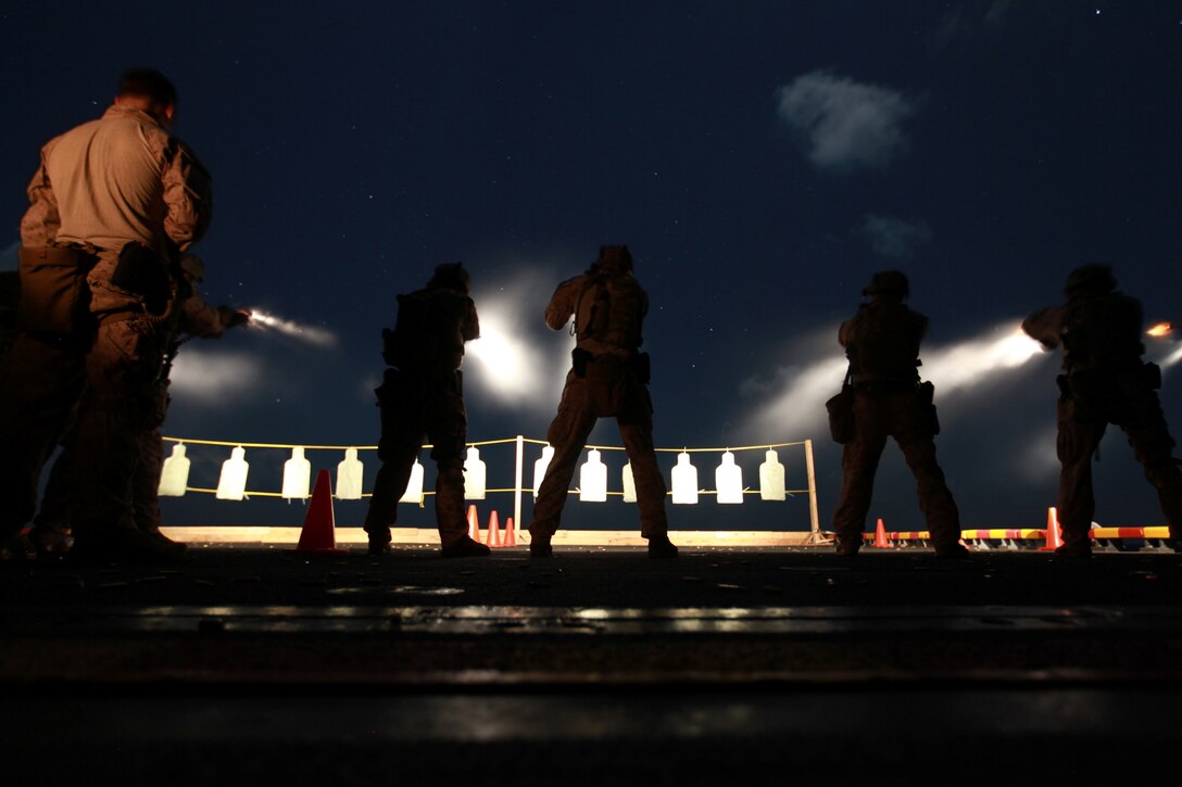 Marines with the 11th Marine Expeditionary Unit's maritime raid force identify targets during a live-fire exercise aboard USS Makin Island (LHD 8) Jan 13. The unit is currently deployed aboard the amphibious assault ship as part of the Makin Island Amphibious Ready Group (MKIARG), which is a U.S. Central Command theater reserve force. The group is also providing support for maritime security operations and theater security cooperation efforts in the U.S. 5th Fleet area of responsibility.