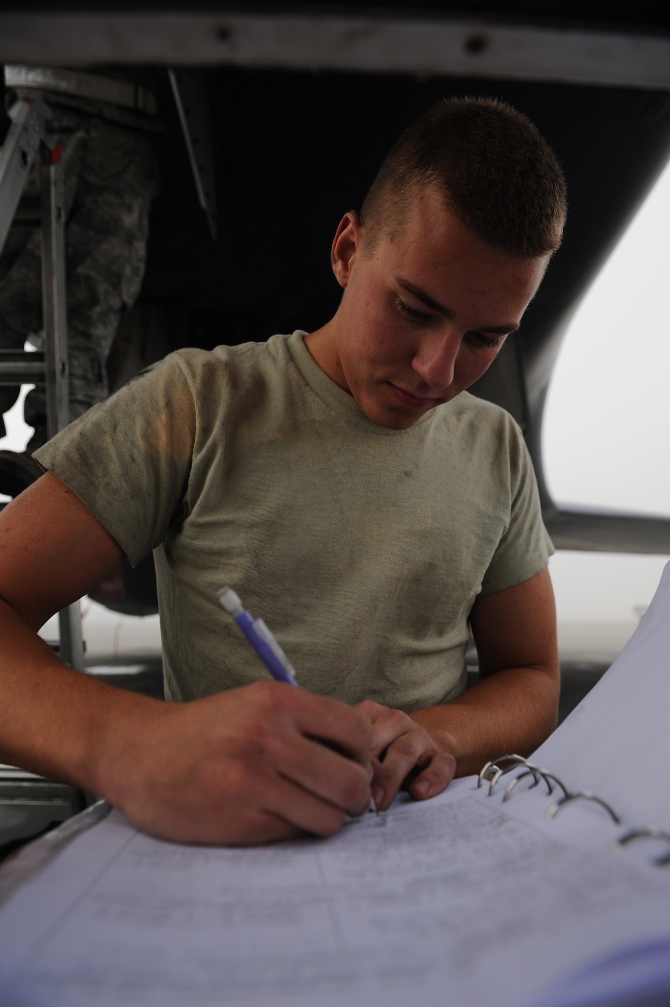 SOUTHWEST ASIA – Airman 1st Class Taylor Bauer, 379th Expeditionary Maintenance Squadron aero-repair technician and native of Germantown, Wisc., annotates work completed on a B-1B Lancer crew entry ladder in an Air Force Technical Order 781T here Jan. 13, 2012. The AFTO 781T documents all maintenance done to an aircraft, which is then input into electronic format for the duration of its life. (U.S. Air Force photo/Staff Sgt. Nathanael Callon)