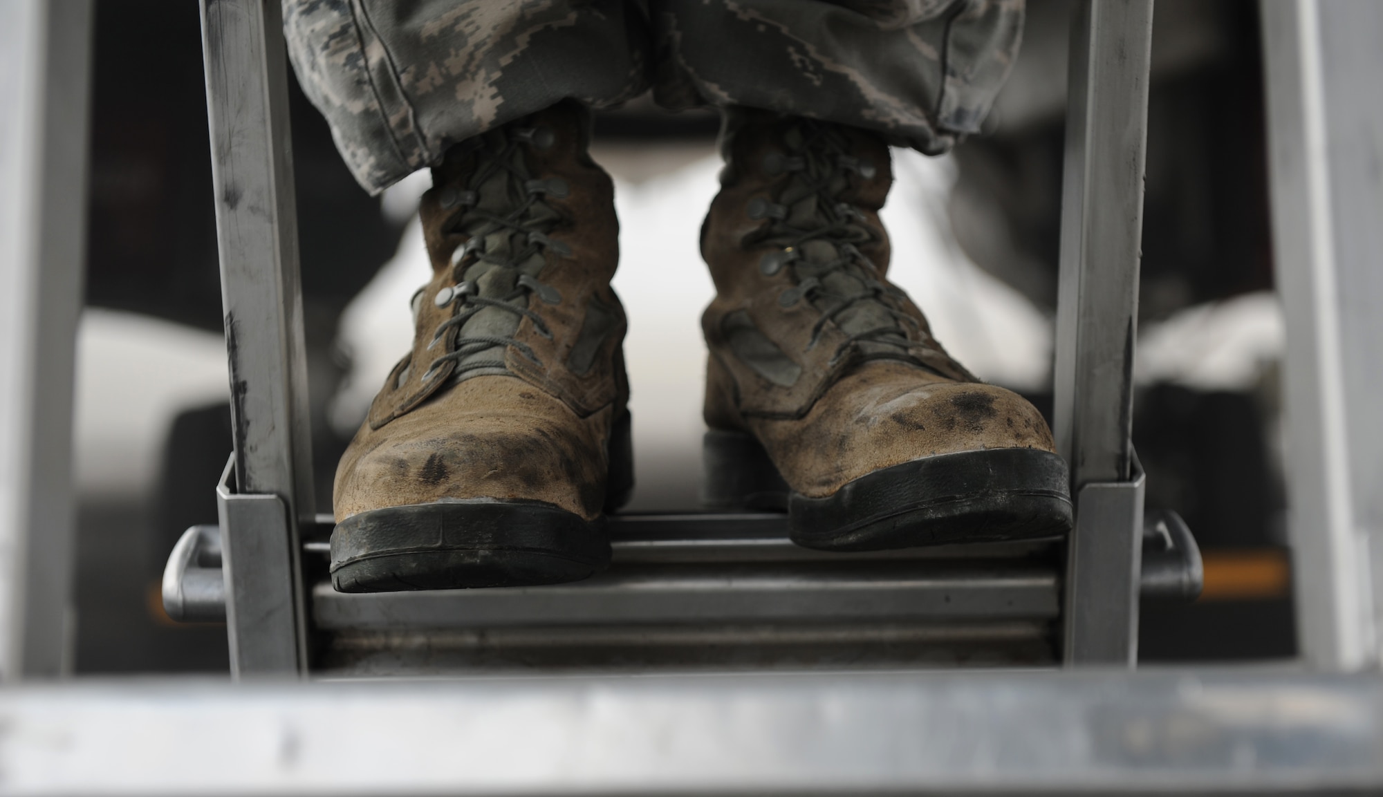 SOUTHWEST ASIA – Staff Sgt. Jesse Hutchings, 379th Expeditionary Maintenance Squadron aero-repair technician and native of Tacoma, Wash., repairs a crew entry ladder on a B-1B Lancer here Jan. 13, 2012. The ladder was not aligned properly, which prevented the door from completely closing. The maintainers fixed the problem by adjusting the gears to allow the ladder to slide smoothly. Hutchings is deployed from Ellsworth Air Force Base, S.D. (U.S. Air Force photo/Staff Sgt. Nathanael Callon))