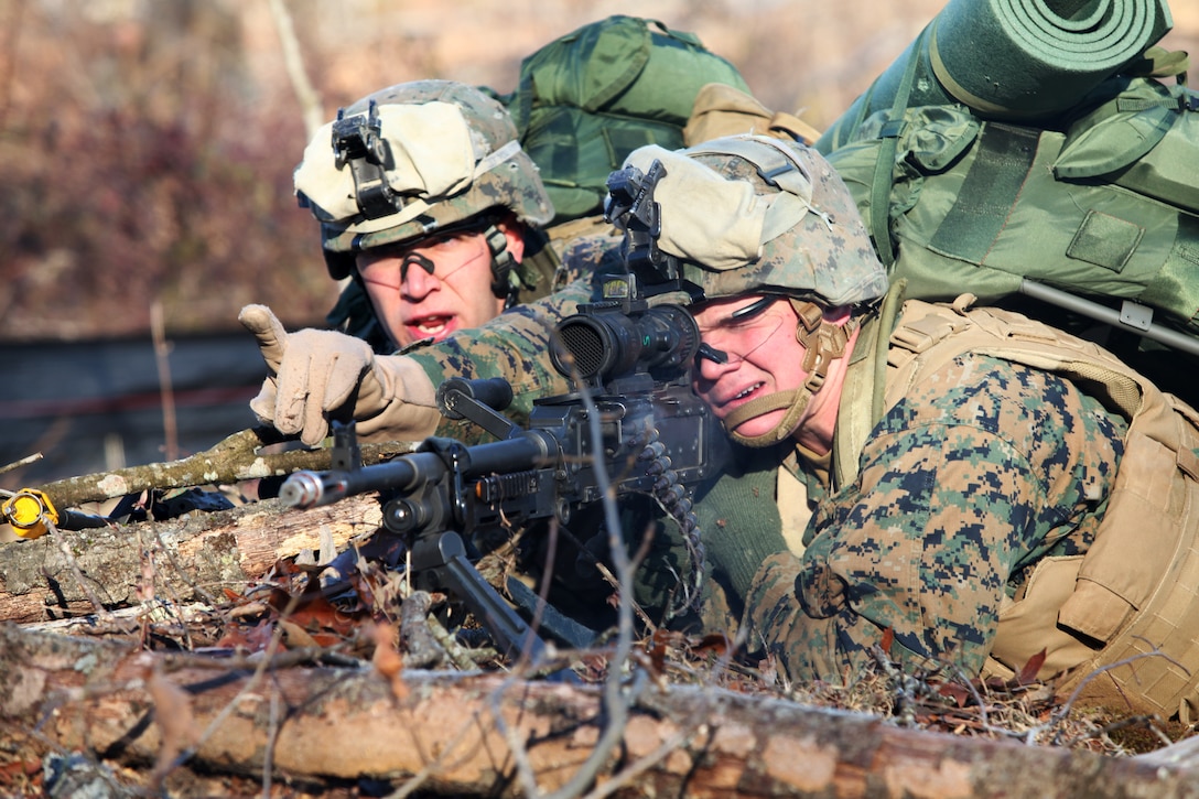 Marines with Bravo Company, Battalion Landing Team 1st Battalion, 2nd Marine Regiment, 24th Marine Expeditionary Unit, assault an enemy target with suppressive fire during a simulated airfield seizure at Farmville Municipal Airport, Va., Jan. 14, 2012. The Marines arranged a Marine Corps Community Day following the airfield seizure to thank the local community for their support and to display the military equipment and capabilities of the unit. The display and seizure were part of the 24th MEU’s Realistic Urban Training (RUT) exercise scheduled Jan. 5-20, which focuses on conducting off-base missions near the town of Farmville to prepare for the various operations they may conduct while deployed.