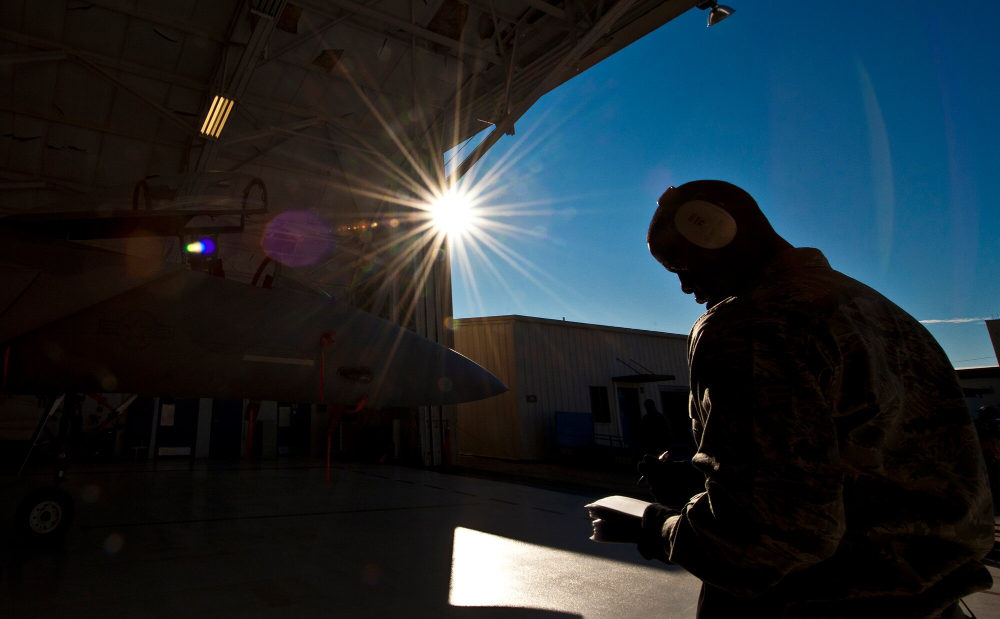 Staff Sgt. Anthony Childers, a 46th Aircraft Maintenance Squadron crew leader, completes checks of his F-15 during the 46th Maintenance Group’s year-end weapons load competition at Eglin Air Force Base, Fla., Jan 13. The best of the best from 46th AMXS met to load a Joint Direct Attack Munition and AIM-9 and a small diameter bomb onto an F-15. The winners will be announced at the 46th MXG annual awards banquet in March. (U.S. Air Force photo/Samuel King Jr.)