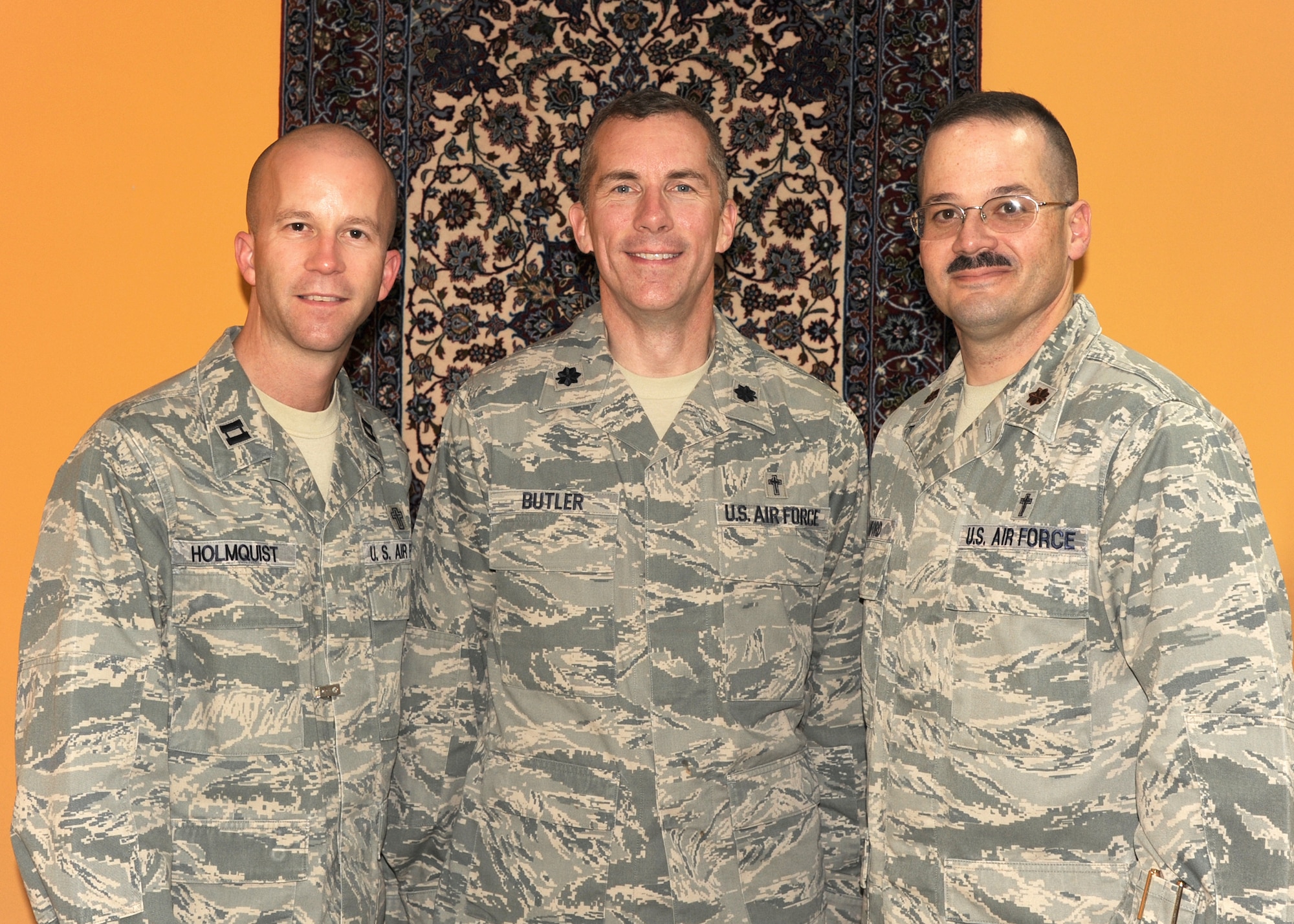 SOUTHWEST ASIA -(Left to right) Chaplains (Capt.) Rolf Holmquist, active duty; (Lt. Col.) Michael Butler, Air National Guardsman; and (Maj.) James Danford, Air Force Reservist, represent each component of the Air Force as the spiritual leaders for the 380th Air Expeditionary Wing. (U.S. Air Force photo/Tech. Sgt. Arian Nead)
