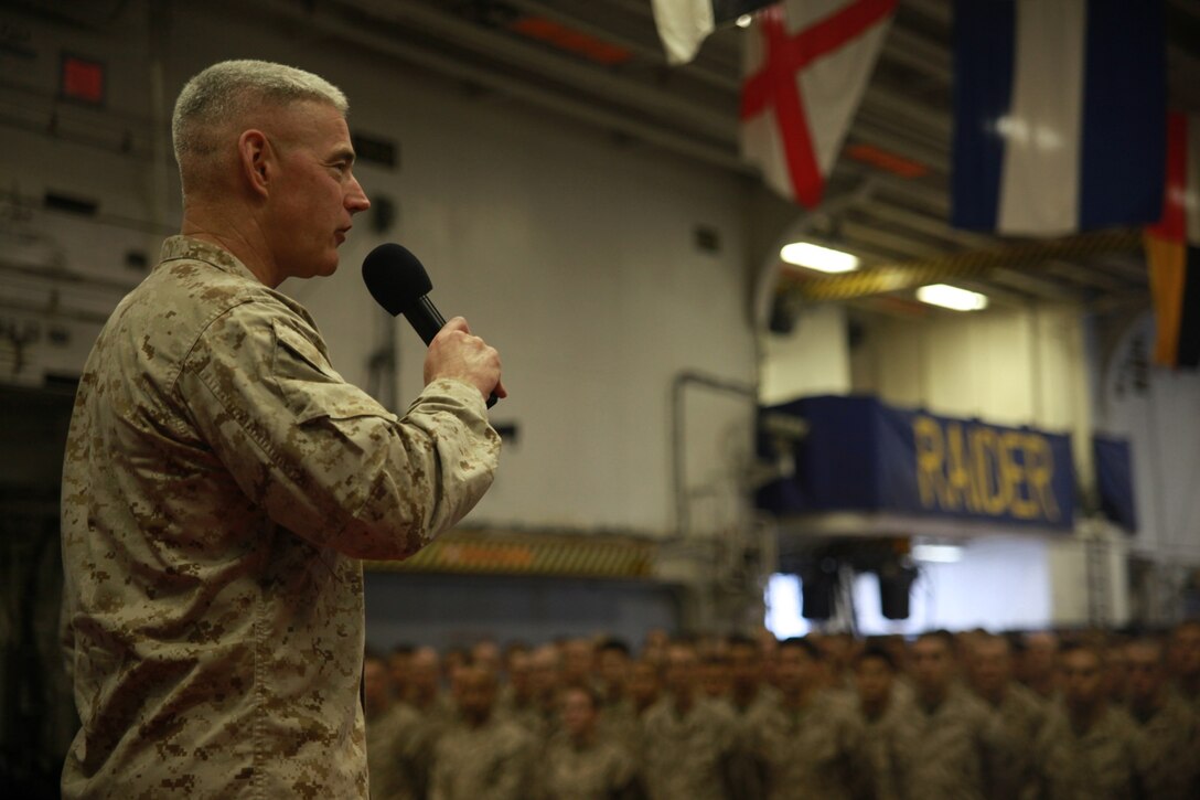 Brig. Gen. Brian D. Beaudreault speaks to the sailors and Marines of the 11th Marine Expeditionary Unit aboard USS Makin Island here Jan. 15. Beaudreault serves as the U.S. Marine Corps Forces Central Command deputy commanding general. The 11th MEU is currently deployed aboard the amphibious assault ship as part of the Makin Island Amphibious Ready Group (MKIARG), which is a U.S. Central Command theater reserve force. The group is also providing support for maritime security operations and theater security cooperation efforts in the 5th Fleet area of responsibility.