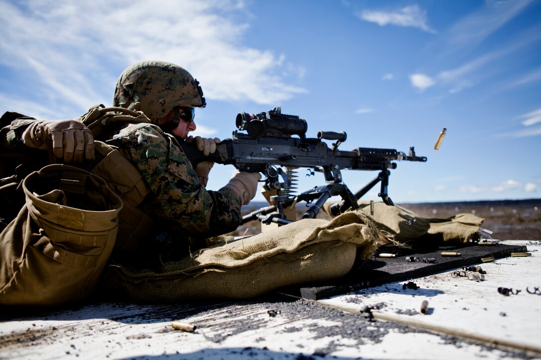 Lance Cpl. David Irvin, a machine gunner with 2nd Battalion, 3rd Marine Regiment, fires his M249 squad automatic weapon during Lava Viper in Pohakuloa Training Area, Hawaii, Jan. 16. Lava Viper is a battalion-level, combined arms training exercise to better prepare Marines for upcoming deployments.