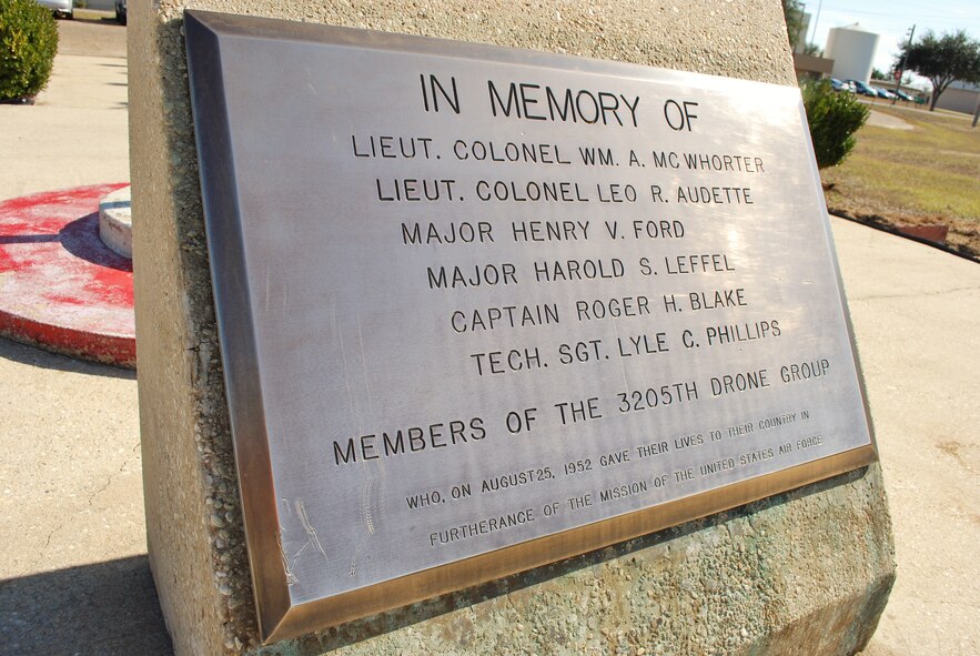 A brass memorial plaque gleams in the sunlight at Duke Field, Fla., shortly after it was restored by base volunteers recently.  A group of 919th Force Support Squadron and Top 3 Association volunteers teamed up to beautify the base’s centrally located memorial area with a host of landscape and maintenance projects.  (Courtesy photo) 