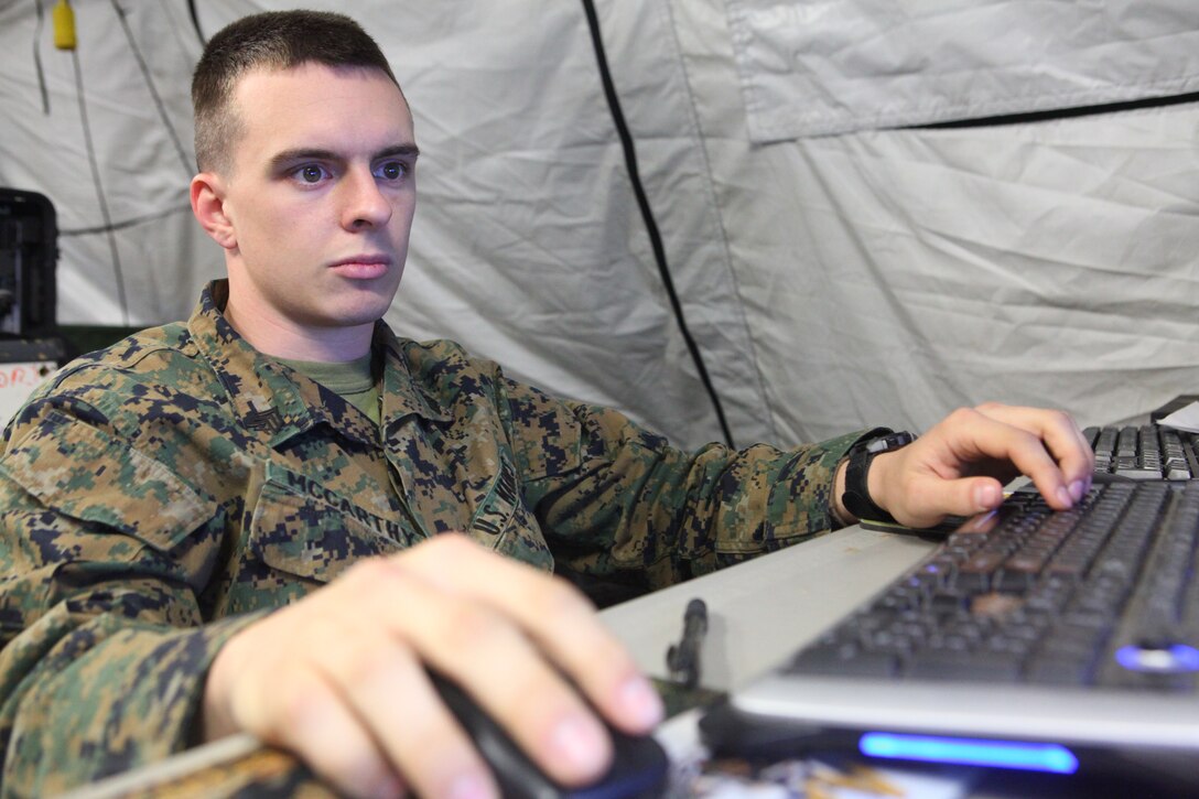 Sgt. Casey McCarthy, a data network specialist with the 24th Marine Expeditionary Unit’s Communications Section, works on a computer in his section, here, Jan. 16, 2012. The Montgomery, Ala., native’s job in the Marine Corps centers on a gambit of computer-centric tasks such as: assembling servers, establishing and trouble shooting a tactical data network, uploading software and more. McCarthy works to keep the 24th MEU’s data network system up and running during the unit’s Realistic Urban Training (RUT) exercise, scheduled Jan. 5-20. The exercise serves to prepare and certify the Marines and Sailors of the 24th MEU for the various operations they may conduct during their upcoming deployment.