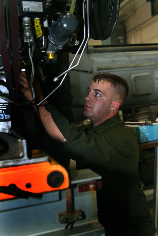 LANCE CPL. JEREME E. JONES::r::::n::::r::::n::Job Title: Flight Line Mechanic::r::::n::Age: 20::r::::n::Unit: Marine Light Attack Helicopter Squadron 467::r::::n::Hometown: Hiawatha, Kansas::r::::n::DATE JOINED: JUNE 9, 2010::r::::n::::r::::n::Lance Cpl. Jereme E. Jones is a mechanic for Marine Light Attack Squadron 467. He is part of the “phase” shop, meaning every helicopter he works on is completely stripped down and rebuilt.::r::::n::This process can involve a lot of stress, considering all the nuts and bolts deep in the crevices of the machines that can barely be reached but still need to be replaced. ::r::::n::The other part of his job is that of “plane captain” for helicopters on takeoff. For the pilots, there has to be another set of eyes checking over the aircraft and certifying them safe to fly. His job is to check and double-check everything to make sure the flight is certified as safe. ::r::::n::With the maintenance provided by Jones and Marines like him, 2nd Marine Aircraft Wing helicopters can stay in the fight.::r::::n::