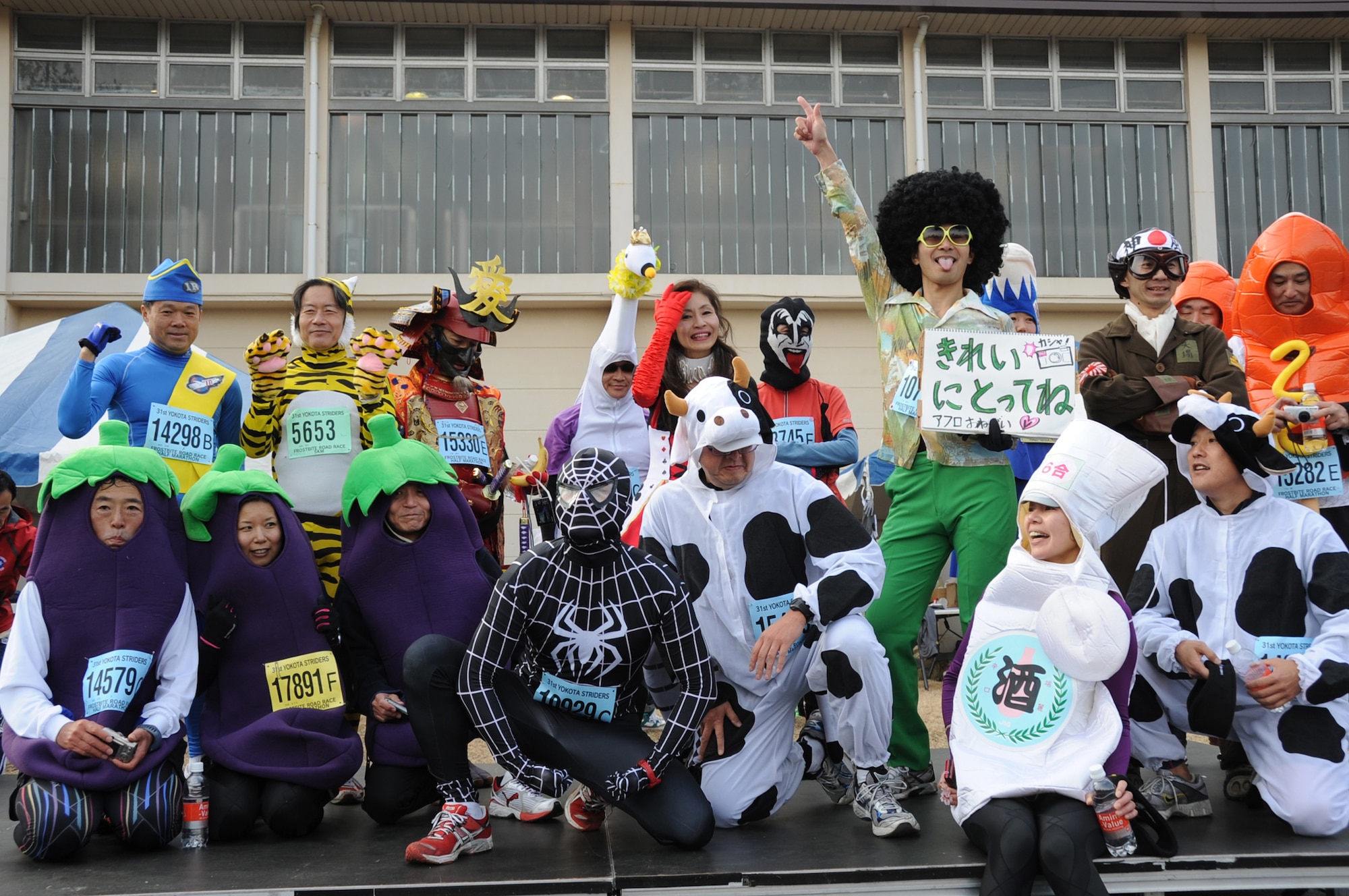 YOKOTA AIR BASE, Japan -- Costumed runners pose for photos after participating in the 31st Annual Frostbite Run held at Yokota Air Base, Japan, Jan. 15, 2012. Some of the more than 10,000 runners who participated chose to wear costumes, an act that has become a yearly tradition. (U.S. Air Force photo/Naoko Kurokui)
