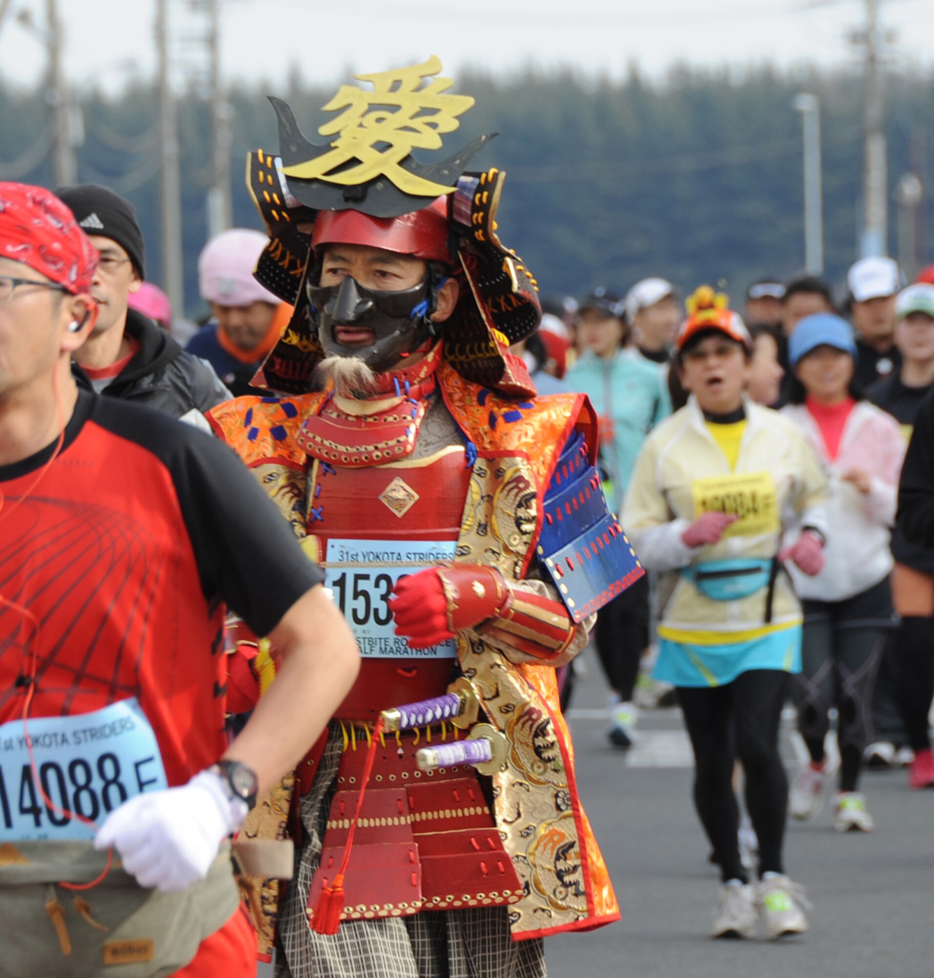 YOKOTA AIR BASE, Japan -- A runner, dressed as a samurai warrior, participates in the 31st Annual Frostbite Run held at Yokota Air Base, Japan, Jan. 15, 2012. Some of the more than 10,000 runners who participated chose to wear costumes, an act that has become a yearly tradition. (U.S. Air Force photo/Naoko Kurokui)