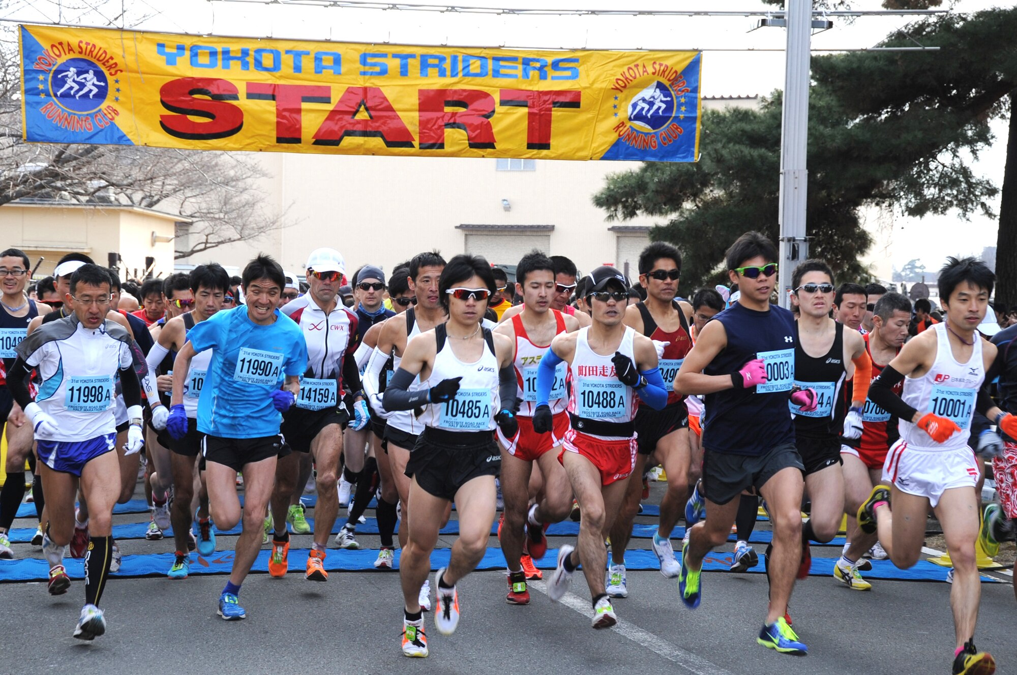 YOKOTA AIR BASE, Japan -- The Yokota Striders Running Club sponsored the 31st Annual Frostbite Run at Yokota Air Base, Japan, Jan. 15, 2012. More than 10,000 runners participated in the event, which included a 2K Kids Run, 2K Family Run, 5K Run and a Half Marathon. (U.S. Air Force photo/Naoko Kurokui)
