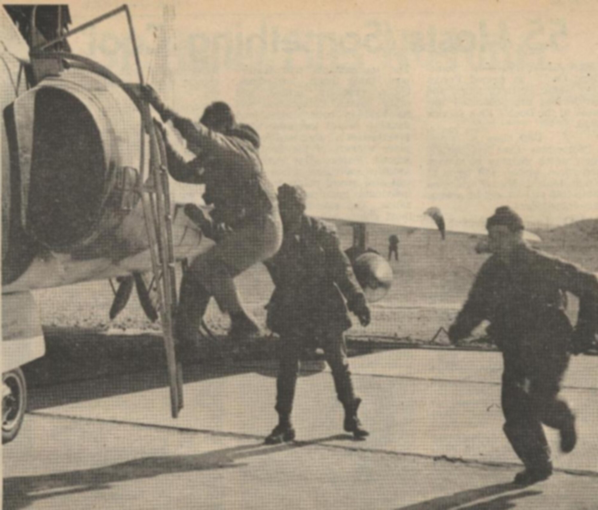 LET’S GO- Racing to their planes during an exercise are F-4 Phantom pilots Maj. Ronald N. Hoelzer (Left) and Maj. George F. McCarty. In the background is SSgt. Roy O. Worthington, Major Hoelzer’s crew chief.