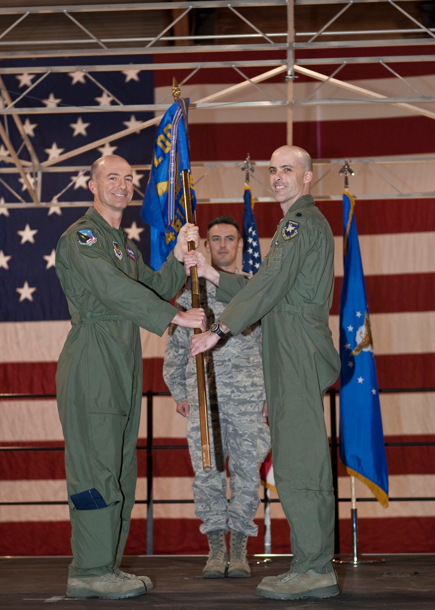 Lt. Col. George N. Schwartz, accepts command of the 461st Flight Test Squadron from Col. Christopher P. Azzano, commander, 412th Operations Group at a Change-of-Command ceremony here Jan. 12. (Lockheed Martin Photo by Tom Reynolds) 