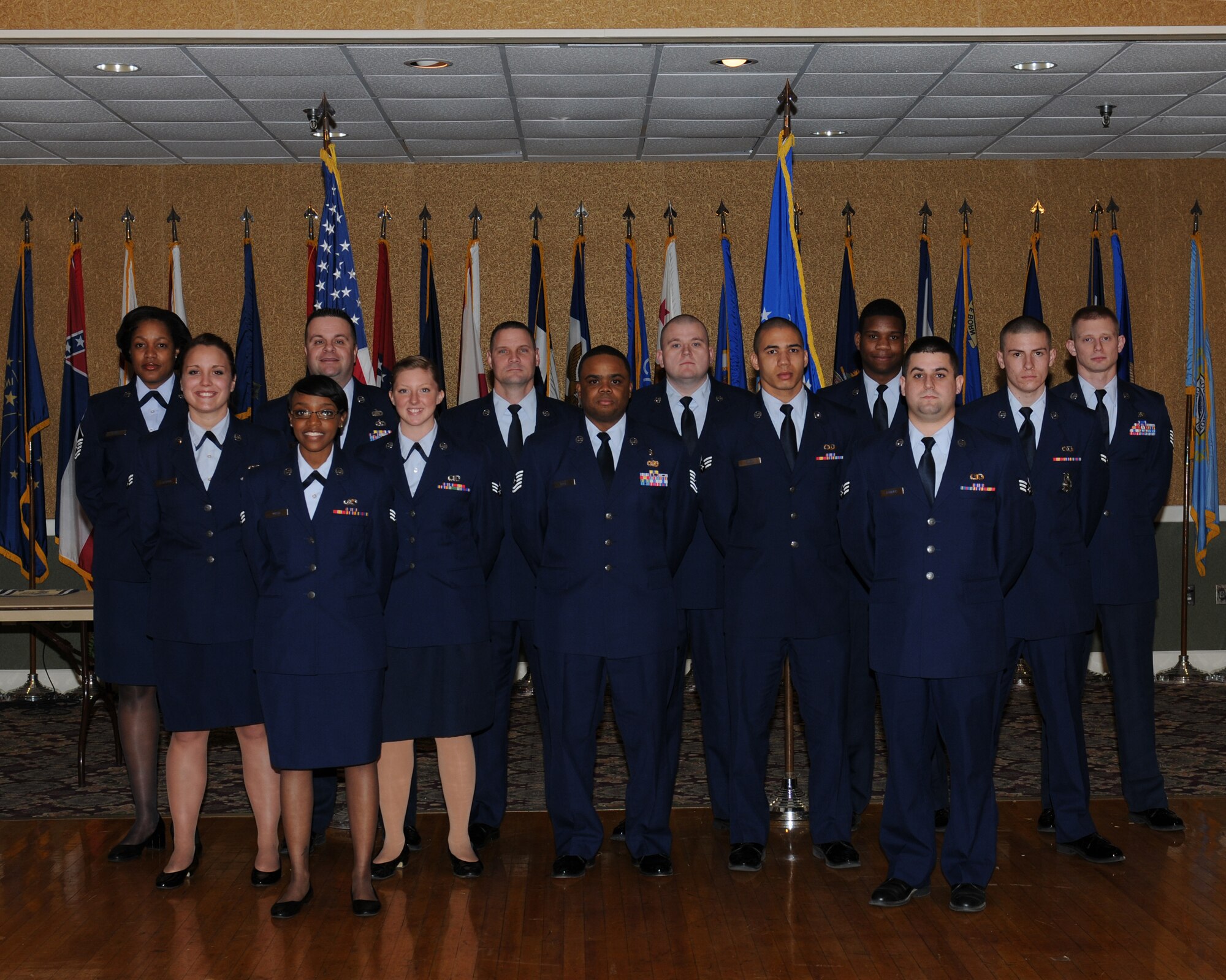 Fourteen of Team BLAZE’s newly promoted enlisted Airmen were promoted at the enlisted promotions ceremony at the Columbus Club on Jan. 3. (Mellissa Doublin)