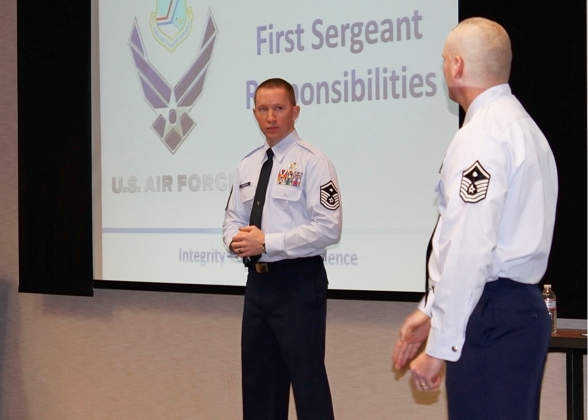Master Sgt. Charles W. Sanders, first sergeant, 95th Security Forces Squadron, and Master Sgt. Bruce R. Stohlman,  first sergeant, 31st Test and Evaluation Squadron, open up the seminar with a welcome to Edwards for those visiting the area. The Additional Duty First Sergeant Seminar brought 68 non-commissioned officers together for a look into the life of a shirt Jan. 9-13. (U.S. Air Force Photo by Meredith Mingledorff) 