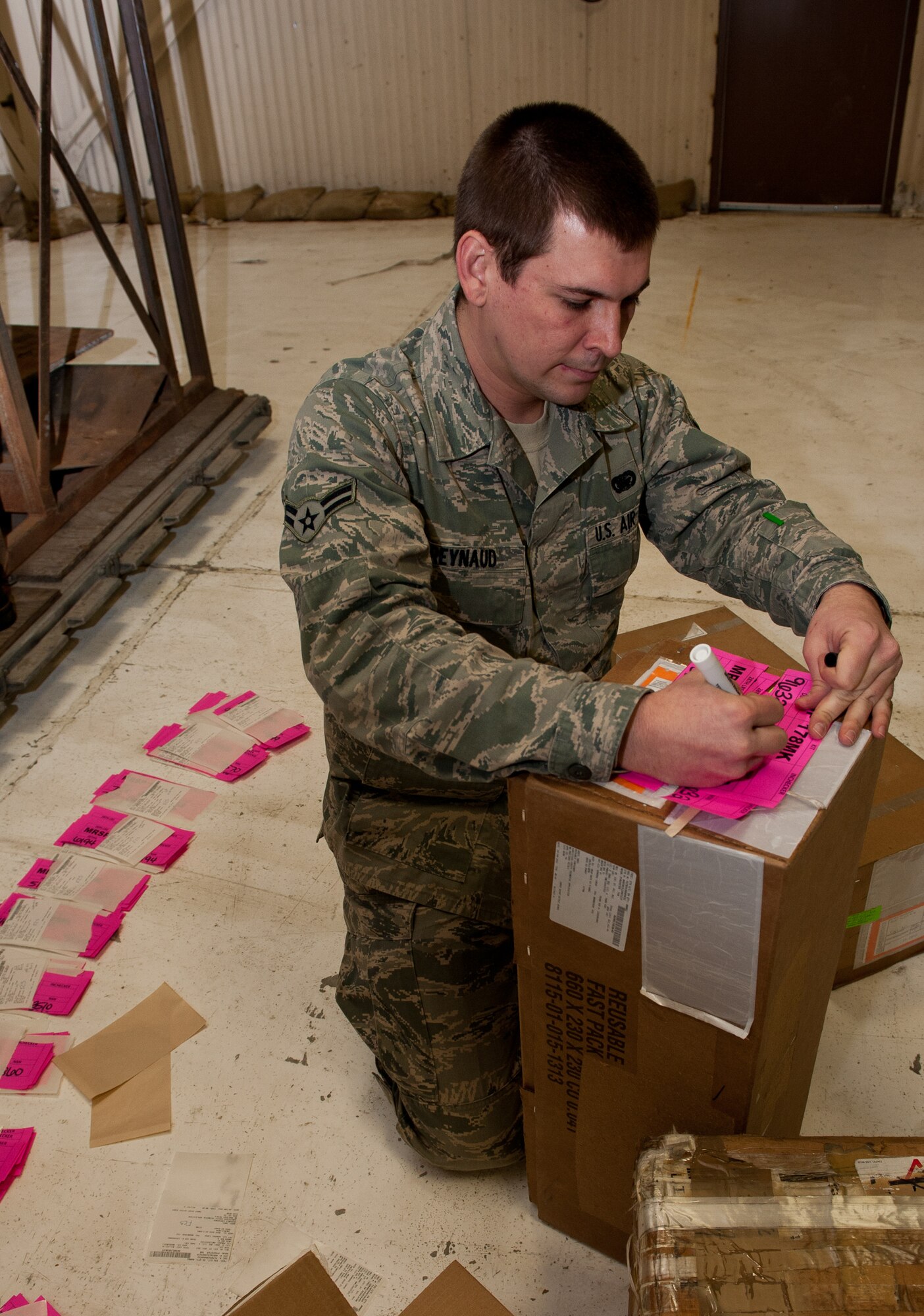 Airman 1st Class Matthew Reynaud, 28th Logistics Readiness Squadron aircraft parts technician, labels boxes of B-1 parts at the aircraft parts store on Ellsworth Air Force Base, S.D., Jan. 10, 2012. These spare parts are part of a mobility readiness package being assembled for the upcoming Red Flag combat training exercise at Nellis AFB, Nev. (U.S. Air Force photo by Airman 1st Class Kate Thornton/Released)