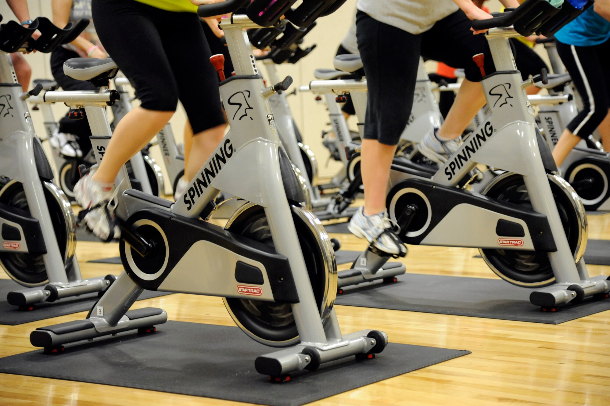 LAUGHLIN AIR FORCE BASE, Texas – Participants pickup speed during a spin class at the third annual Aerobathon at the Losano Fitness Center here Jan. 14. The Aerobathon is an event designed to showcase the various aerobics classes offered at the gym for people to participate in. (U.S. Air Force photo/Airman 1st Class Nathan L. Maysonet)  
